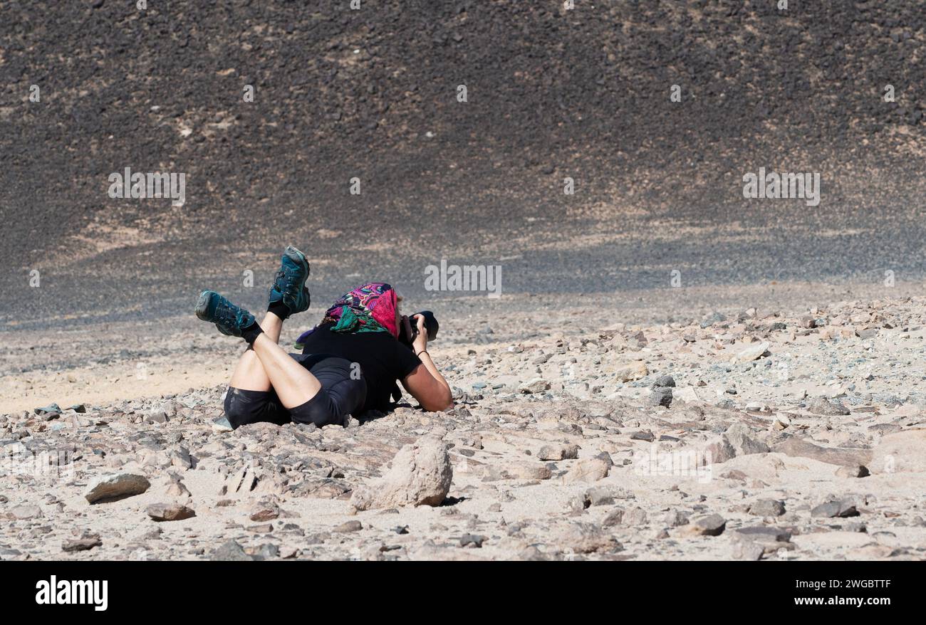 Woman lying in desert hi-res stock photography and images - Alamy