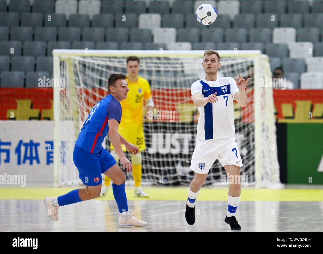Xi'an, China's Shaanxi Province. 4th Feb, 2024. Finland's Tero Intala (R) vies for a header during a match between Finland and Slovakia at the CFA 'Yulin Tourism Investment' Cup Futsal International Tournament 2024 in Xi'an, northwest China's Shaanxi Province, Feb. 4, 2024. Credit: Li Yibo/Xinhua/Alamy Live News Stock Photo