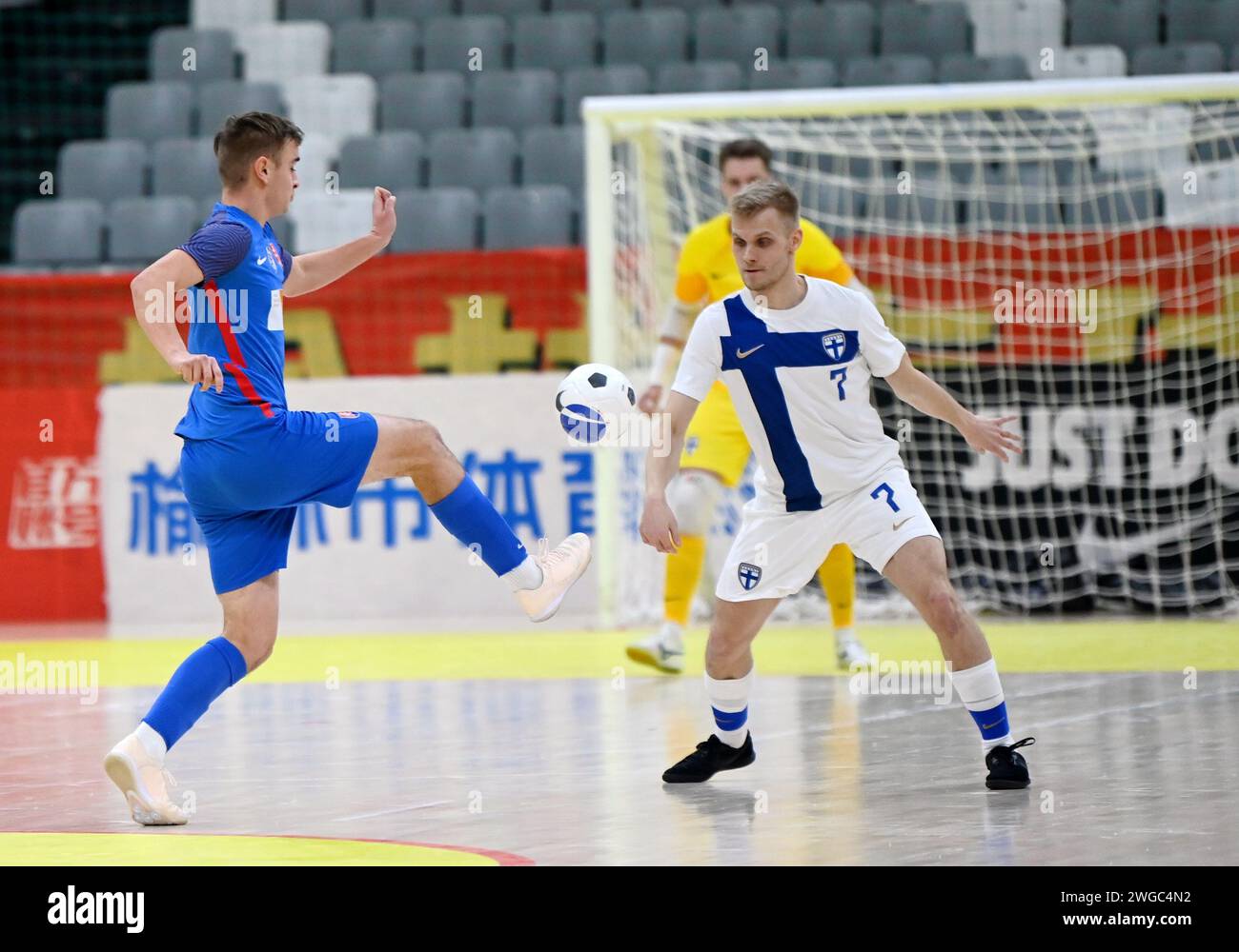 Xi'an, China's Shaanxi Province. 4th Feb, 2024. Finland's Tero Intala (R) defends Slovakia's Vrabel Adam during a match between Finland and Slovakia at the CFA 'Yulin Tourism Investment' Cup Futsal International Tournament 2024 in Xi'an, northwest China's Shaanxi Province, Feb. 4, 2024. Credit: Li Yibo/Xinhua/Alamy Live News Stock Photo