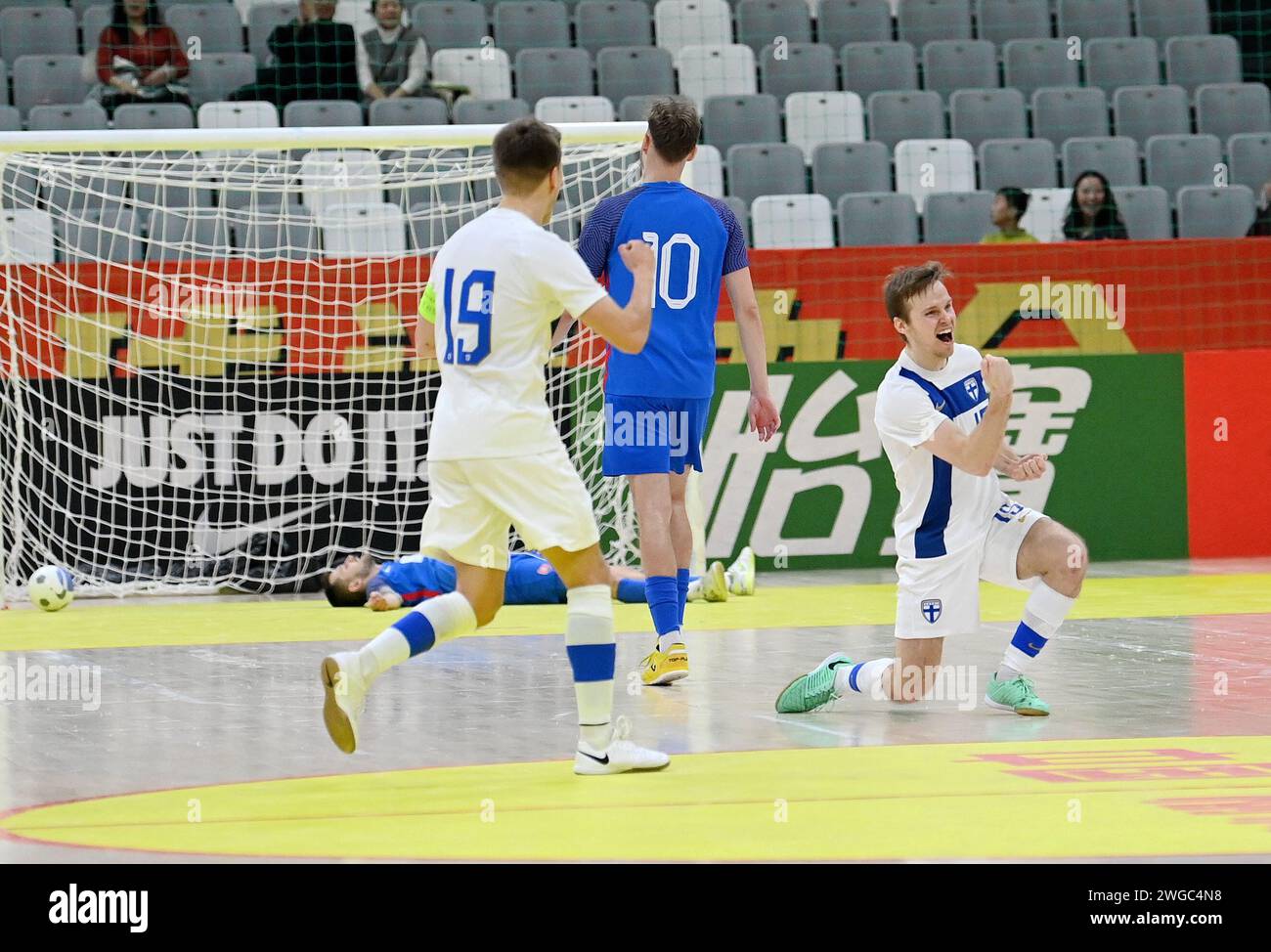 Xi'an, China's Shaanxi Province. 4th Feb, 2024. Finland's Olli Poylio (1st R) celebrates after scoring the winning goal during a match between Finland and Slovakia at the CFA 'Yulin Tourism Investment' Cup Futsal International Tournament 2024 in Xi'an, northwest China's Shaanxi Province, Feb. 4, 2024. Credit: Li Yibo/Xinhua/Alamy Live News Stock Photo