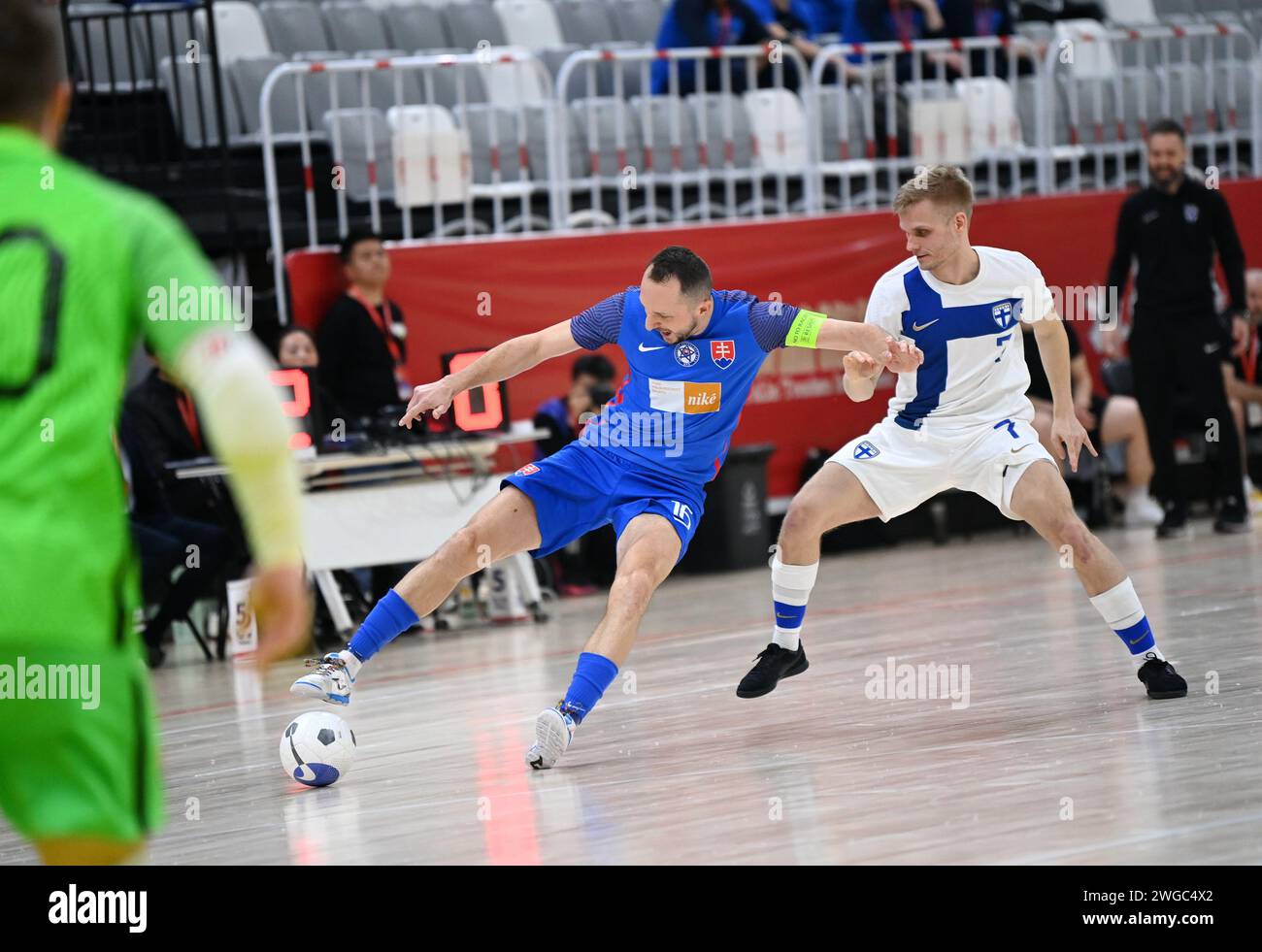 Xi'an, China's Shaanxi Province. 4th Feb, 2024. Slovakia's Drahovsky Tomas (L) vies with Finland's Tero Intala during a match between Finland and Slovakia at the CFA 'Yulin Tourism Investment' Cup Futsal International Tournament 2024 in Xi'an, northwest China's Shaanxi Province, Feb. 4, 2024. Credit: Li Yibo/Xinhua/Alamy Live News Stock Photo