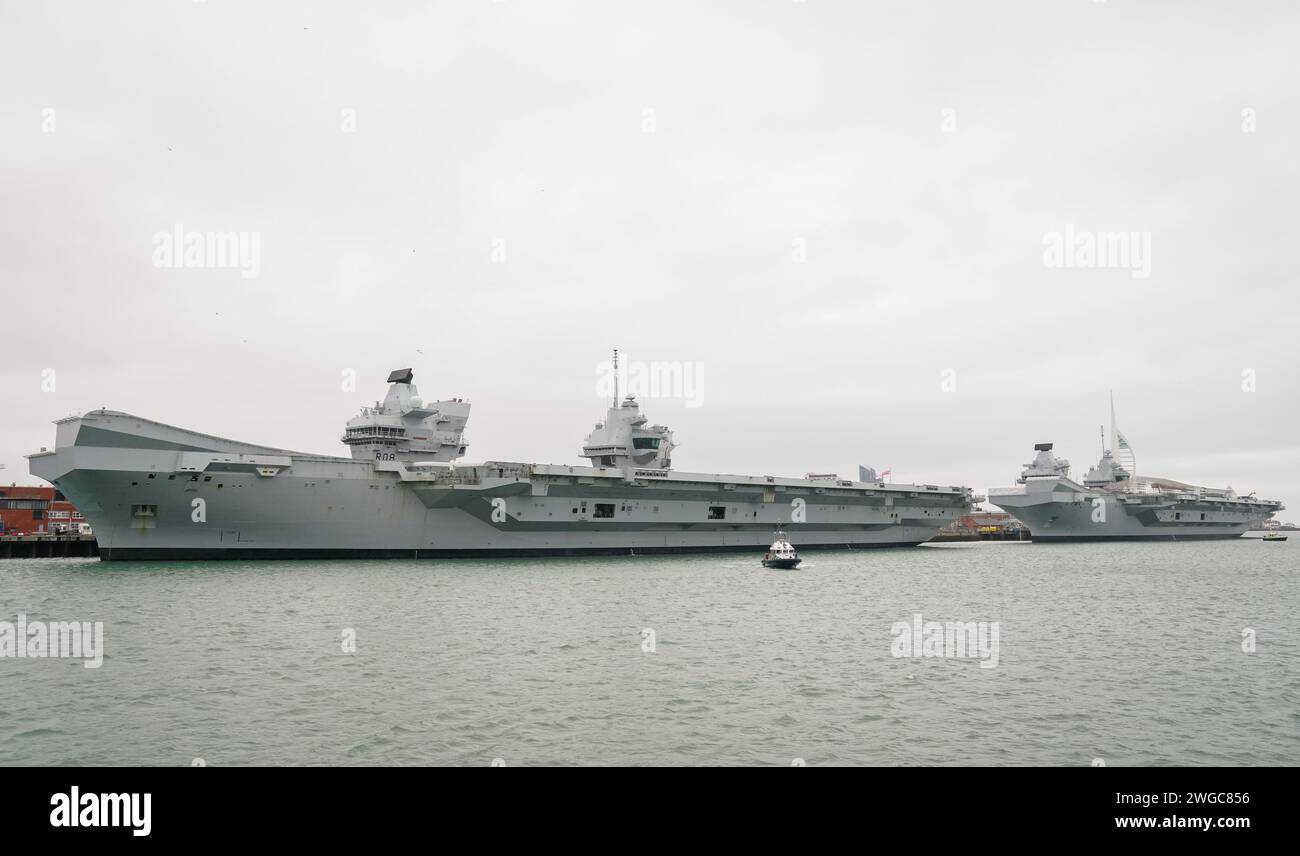 The Royal Navy aircraft carriers HMS Queen Elizabeth (left) and HMS