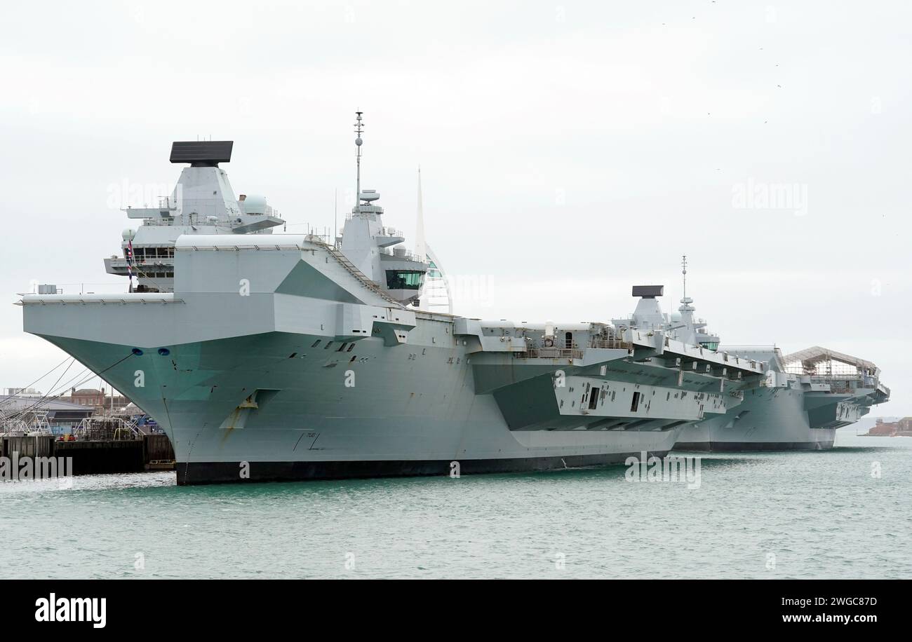 The Royal Navy aircraft carriers HMS Queen Elizabeth (left) and HMS