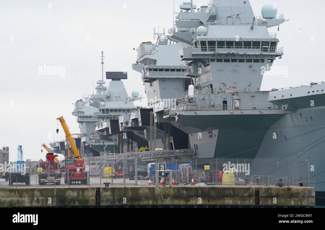 The Royal Navy aircraft carriers HMS Queen Elizabeth (right) and HMS