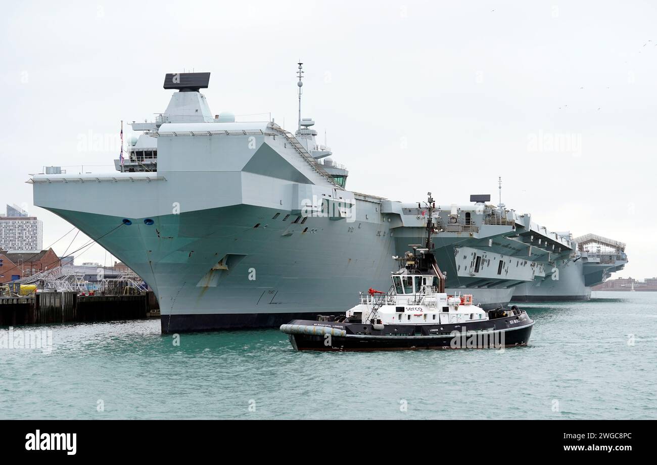 The Royal Navy aircraft carriers HMS Queen Elizabeth (left) and HMS
