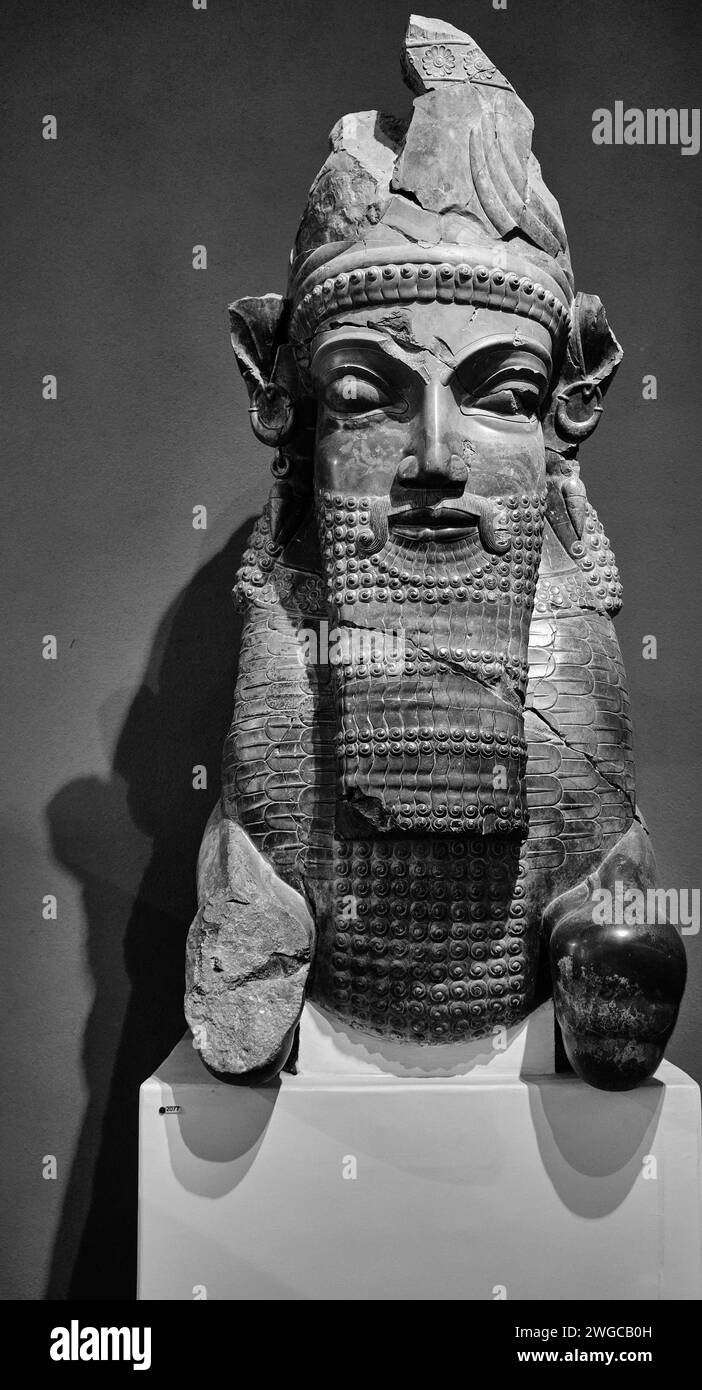 Tehran (Teheran), Iran, 06.24.2023: relief of King's battle with lion. Ancient Iran national Museum. Black and white photo. Stock Photo