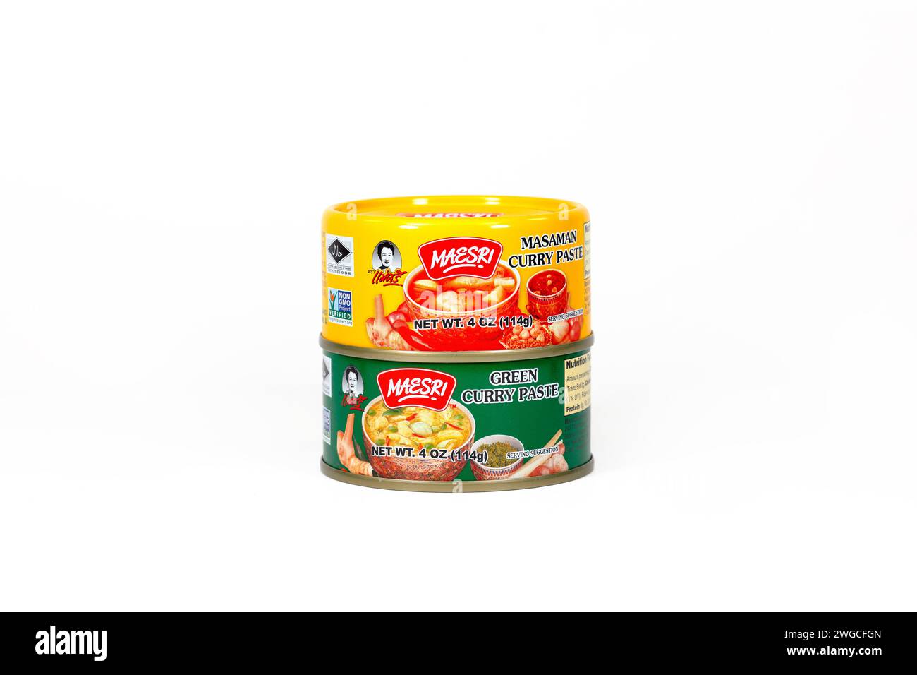 Two cans of Maesri Thai curry paste, Masaman Curry, Green Curry isolated on a white background. cutout for illustration and editorial. Stock Photo