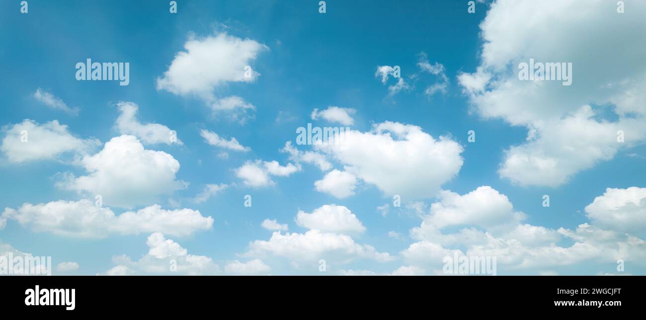 White fluffy clouds with blue sky on daylight Stock Photo