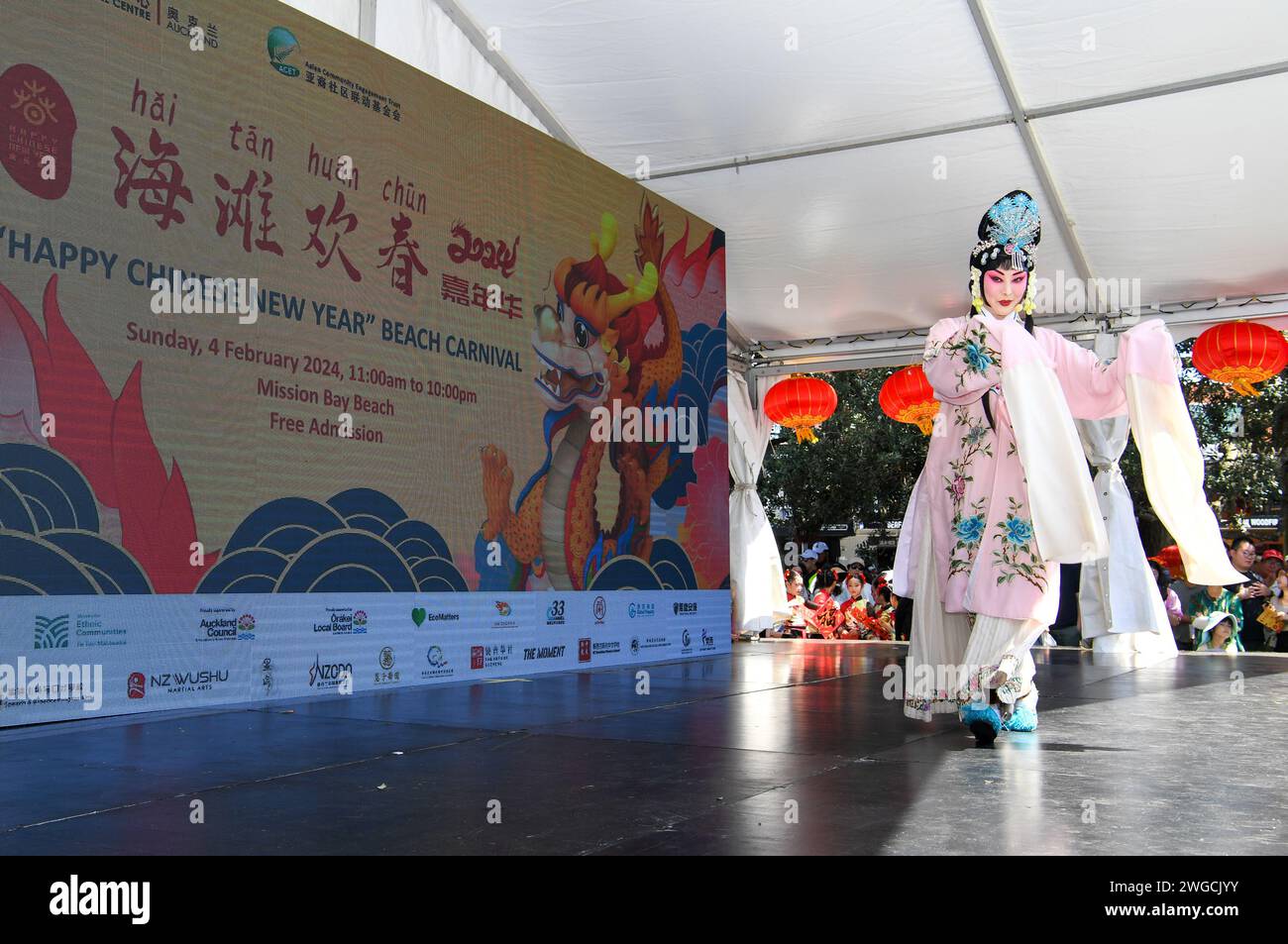 Auckland, New Zealand. 4th Feb, 2024. An actor performs Peking Opera during the 'Happy Chinese New Year' Beach Carnival in Auckland, New Zealand, Feb. 4, 2024. The 'Happy Chinese New Year' Beach Carnival, co-hosted by the China Cultural Centre in Auckland and the Asian Community Engagement Trust, was held at the Mission Bay Beach in Auckland on Sunday. Credit: Guo Lei/Xinhua/Alamy Live News Stock Photo
