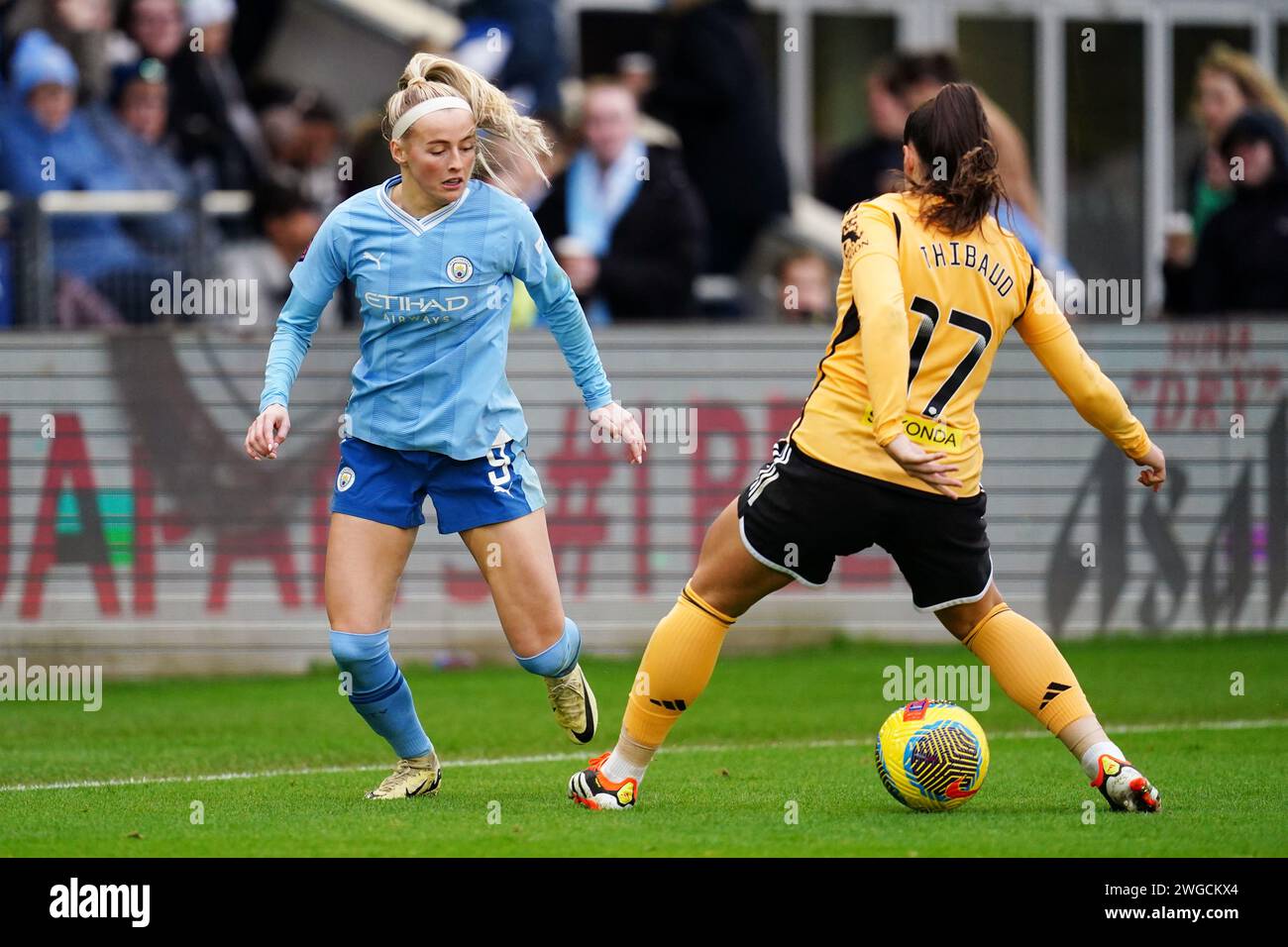 Manchester City's Chloe Kelly (left) in action with Leicester City's Julie Thibaud during the Barclays Women's Super League match at the Joie Stadium, Manchester. February 4, 2024. Stock Photo