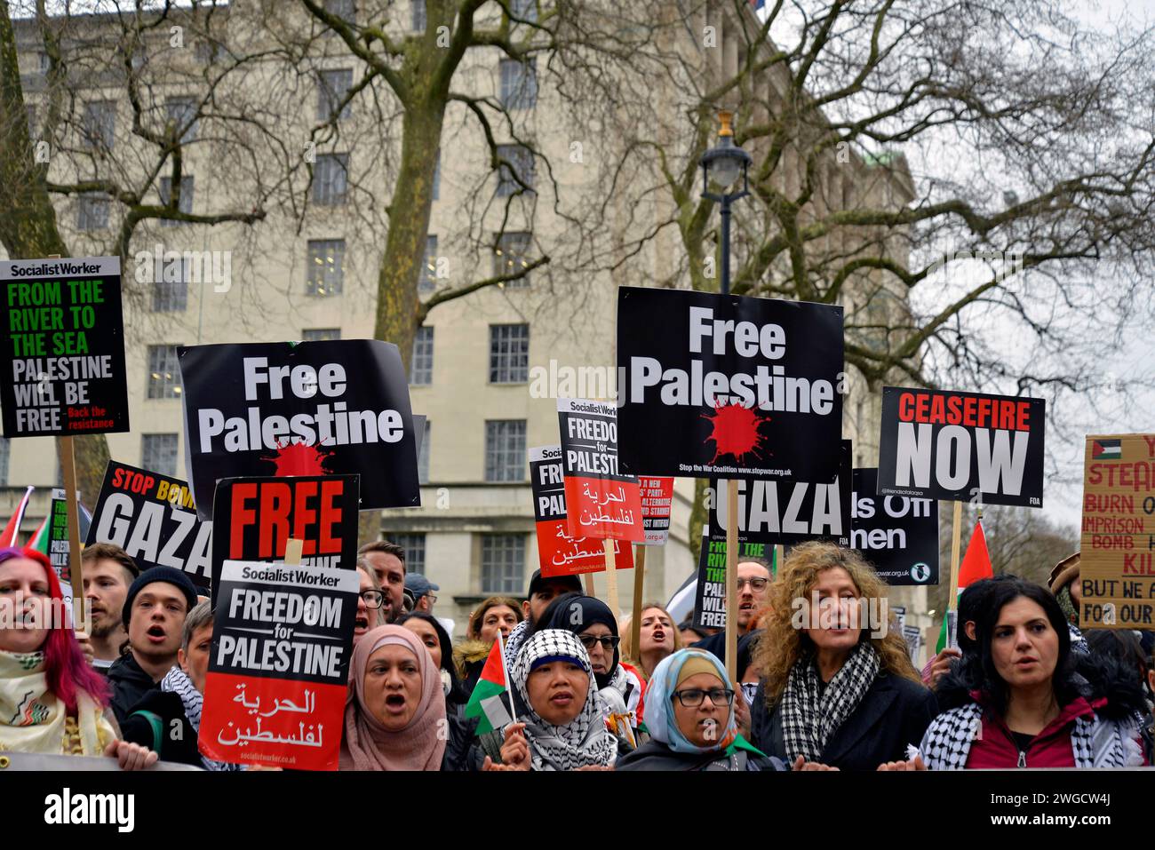 Pro-Palestinian protesters near Downing St demonstrate against the continuing Israeli military invasion of Gaza. 3rd February 2024. London. Stock Photo