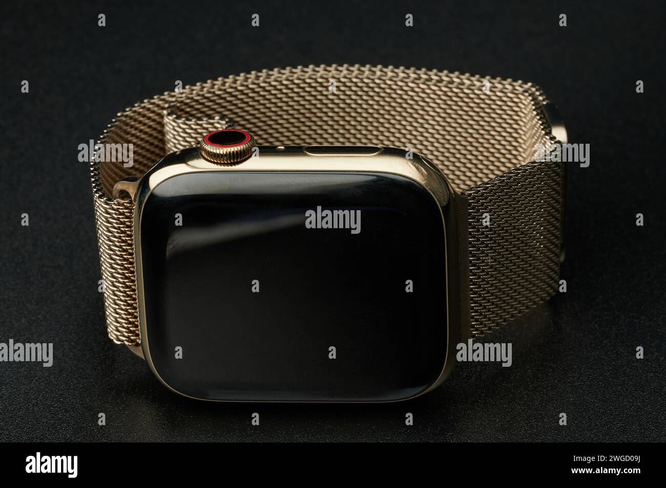 New York, USA - January 31, 2024: Luxury Apple watch series 8 in gold color stainless steel case with link band Stock Photo