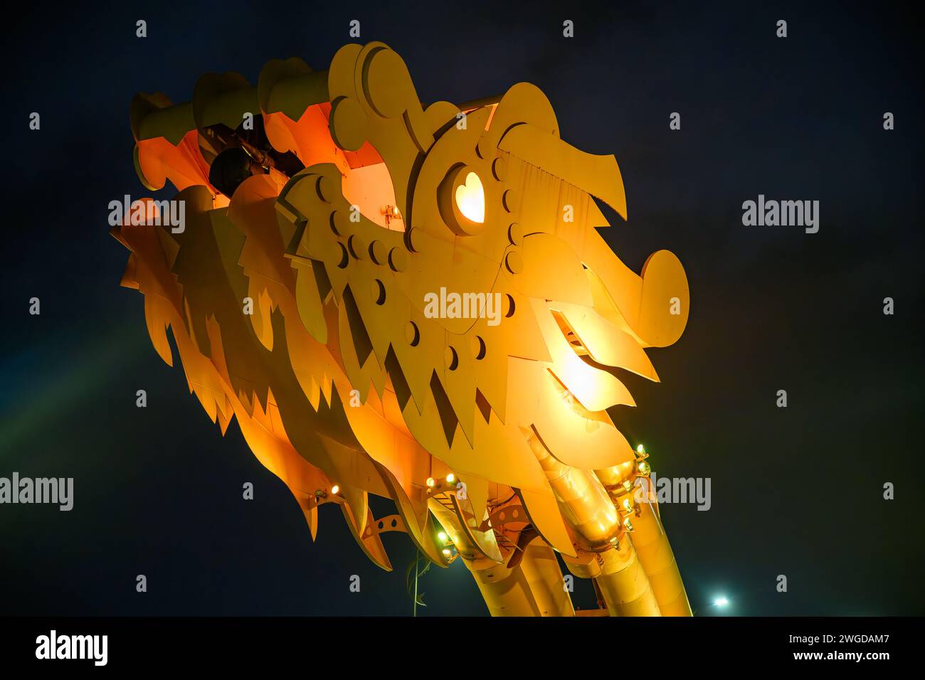 A close up shot of the dragon's head at night, Dragon Bridge, Da Nang, Vietnam Stock Photo