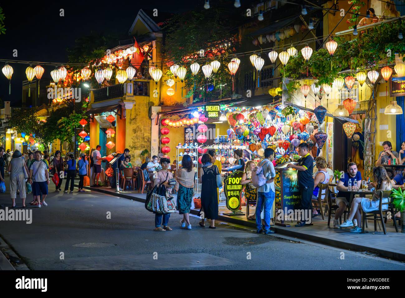 Selling clothes and souvenirs at Hoi An Night Market, Vietnam Stock