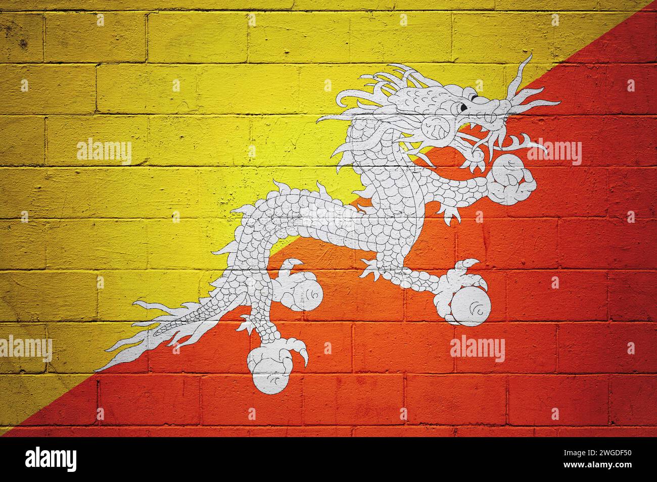 Flag of Bhutan painted on a cinder block wall Stock Photo - Alamy
