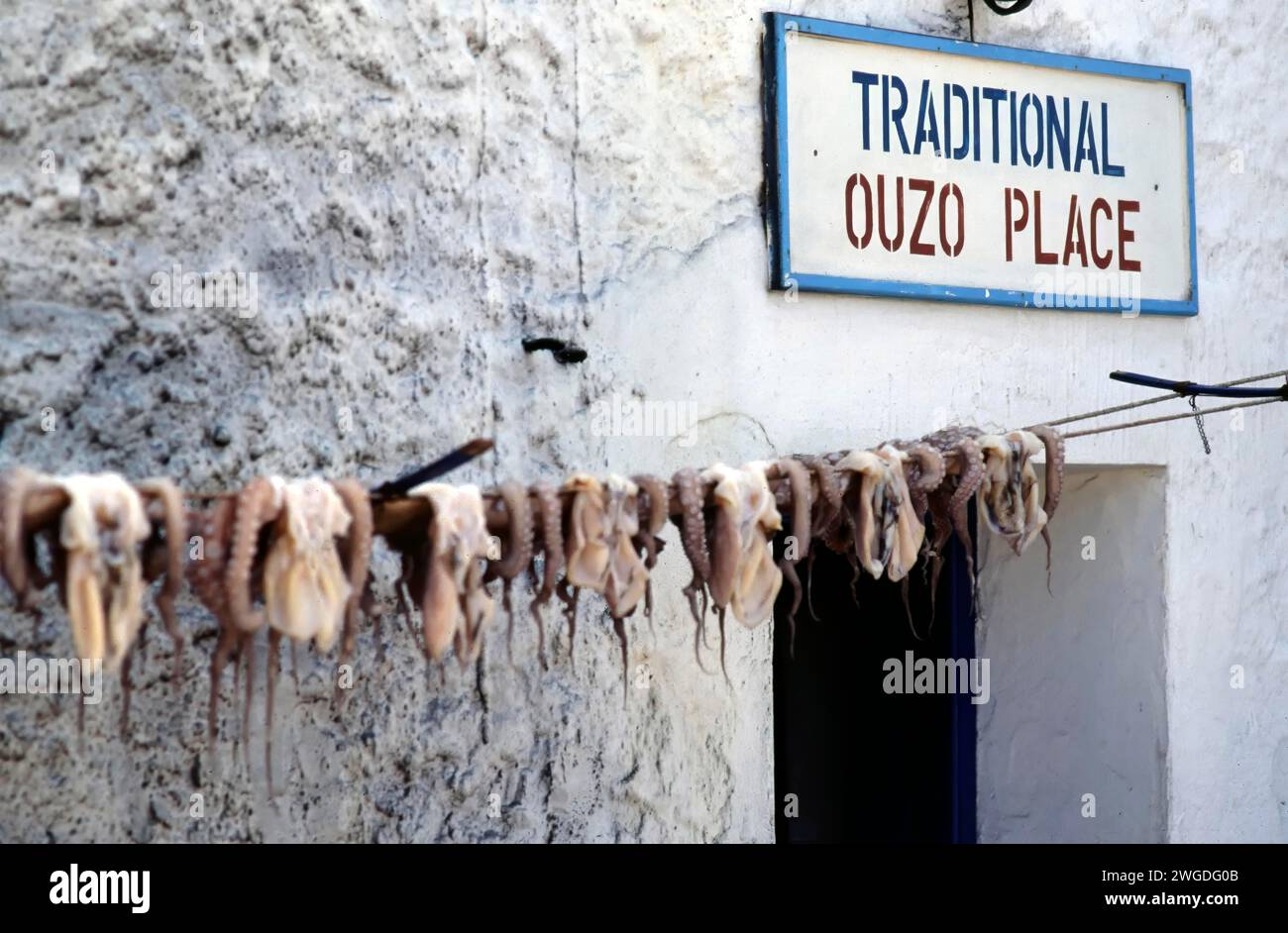 Traditional Greek tavern, Ouzo Place, southern Aegean Sea, Cyclades, Greece, Europe, 1990 Stock Photo