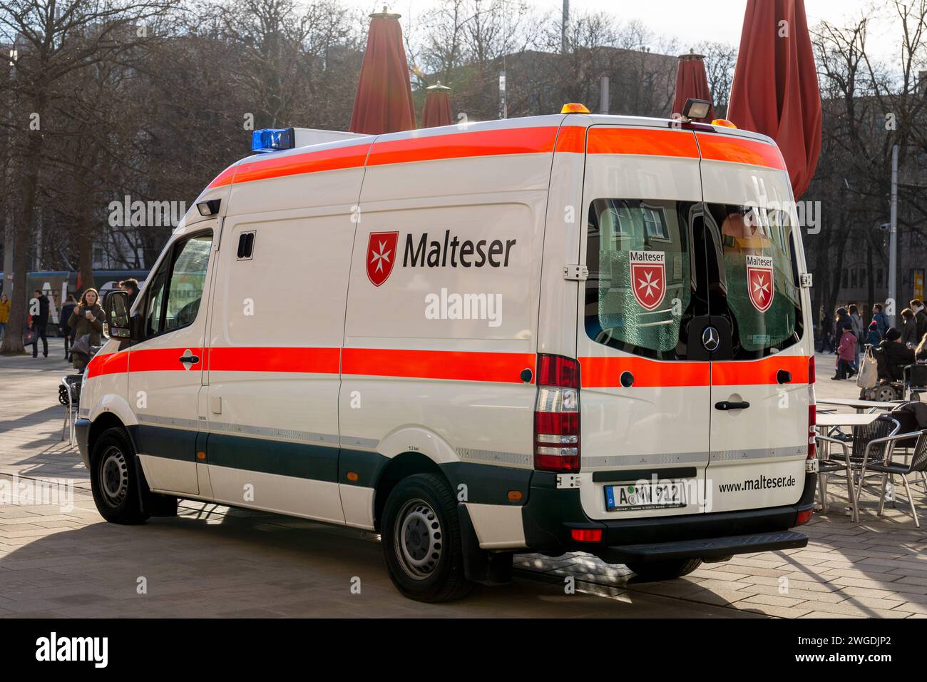 Augsburg, Bavaria, Germany - February 3, 2024: Malteser ambulance in the city center of Augsburg *** Rettungswagen von Malteser in der Innenstadt von Augsburg Stock Photo