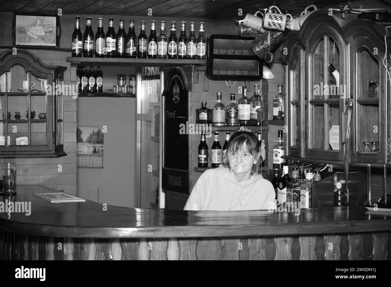 Lady Dorota, owner of a pub, local legend. Portrait of a mature woman. Barmaid.Gniezno, Poland. Stock Photo