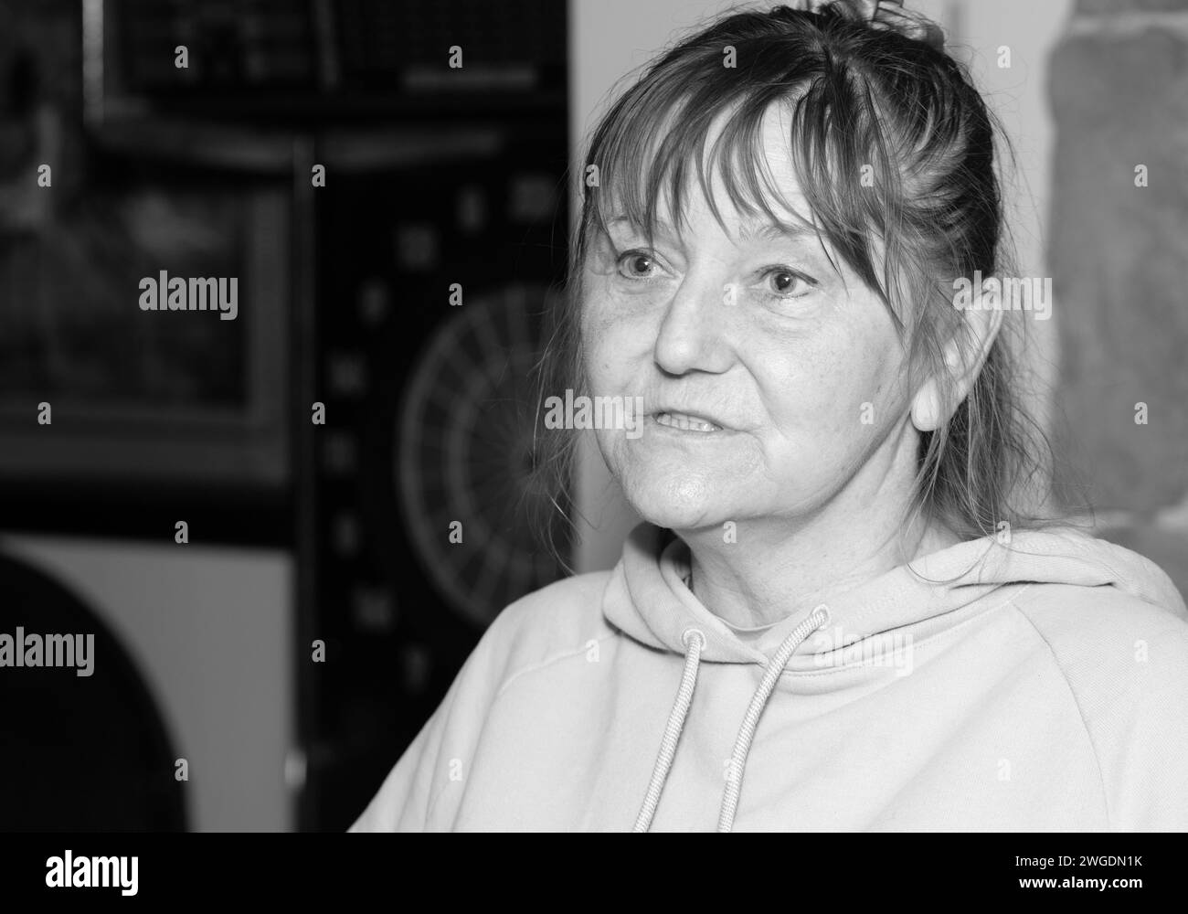 Lady Dorota, owner of a pub, local legend. Portrait of a mature woman. Barmaid.Gniezno, Poland. Stock Photo