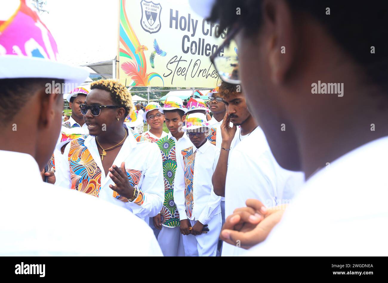 PORT OF SPAIN - JAN 14: Members of Holy Cross College steelpan band compete in the Junior Panorama Finals as part of Trinidad Carnival in the Queen's Stock Photo