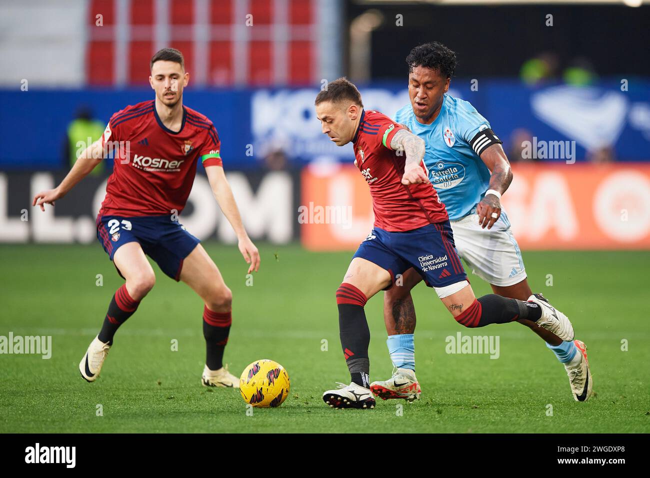 Pamplona, Spain. 04th Feb, 2024. Ruben Pena of CA Osasuna duels for the ball with Renato Tapia of RC Celta during the LaLiga EA Sports match between CA Osasuna and RC Celta at El Sadar Stadium on February 04, 2024 in Pamplona, Spain. Credit: Cesar Ortiz Gonzalez/Alamy Live News Credit: Cesar Ortiz Gonzalez/Alamy Live News Stock Photo