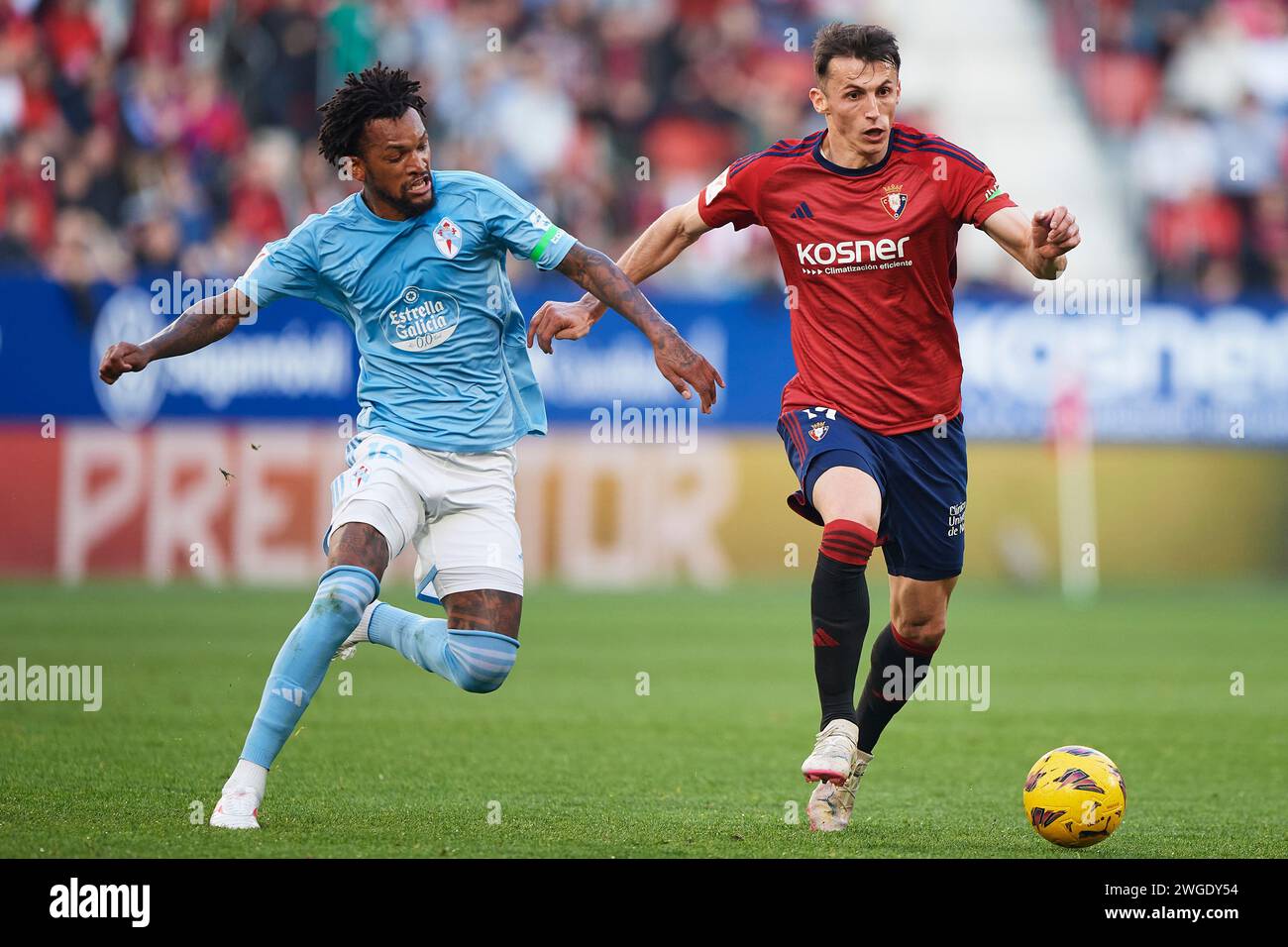 Pamplona, Spain. 04th Feb, 2024. Ante Budimir of CA Osasuna duels for the ball with Renato Tapia of RC Celta during the LaLiga EA Sports match between CA Osasuna and RC Celta at El Sadar Stadium on February 04, 2024 in Pamplona, Spain. Credit: Cesar Ortiz Gonzalez/Alamy Live News Credit: Cesar Ortiz Gonzalez/Alamy Live News Stock Photo