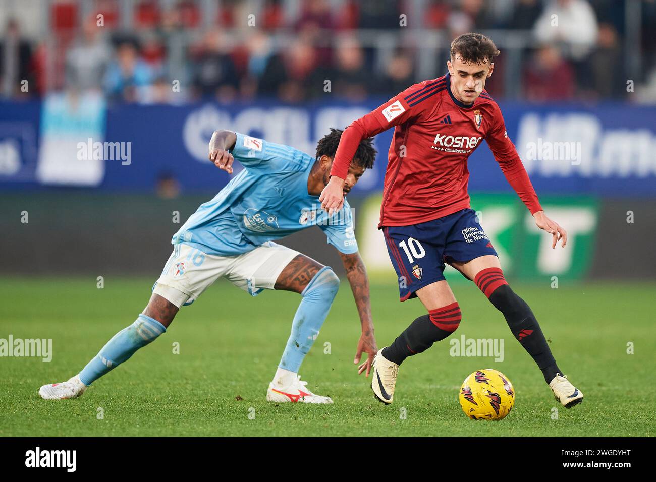 Pamplona, Spain. 04th Feb, 2024. Aimar Oroz of CA Osasuna duels for the ball with Jonathan Bamba of RC Celta during the LaLiga EA Sports match between CA Osasuna and RC Celta at El Sadar Stadium on February 04, 2024 in Pamplona, Spain. Credit: Cesar Ortiz Gonzalez/Alamy Live News Credit: Cesar Ortiz Gonzalez/Alamy Live News Stock Photo