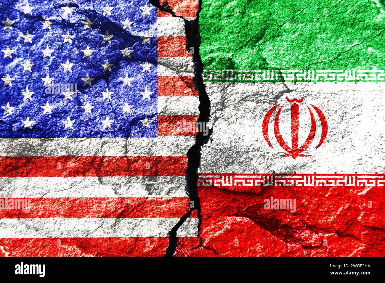 Flags Of The United States And Iran On A Broken Ground, Photo Assembly Stock Photo