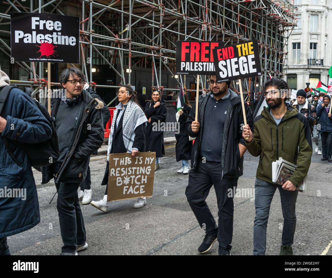London, UK. 3rd February 2024. Free Palestine and End the Siege banners held by peace activists and protesters during the Pro - Palestine march through Oxford Street in Soho, Free Palestine Movement, London, UK Stock Photo