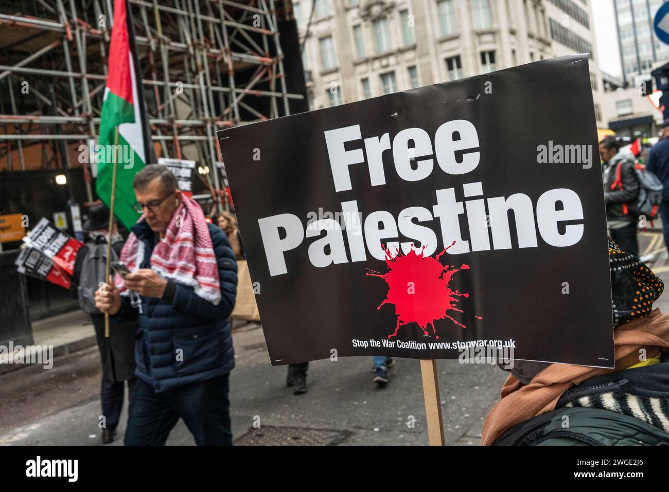 London, UK. 3rd February 2024. Free Palestine banner held by a peace