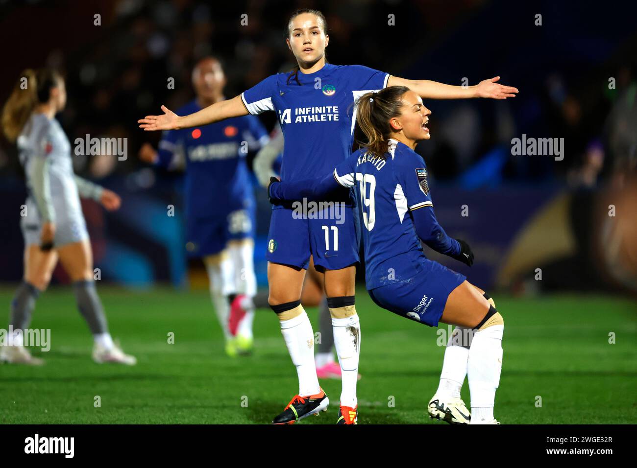 Chelsea's Guro Reiten (centre) celebrates scoring their side's first ...
