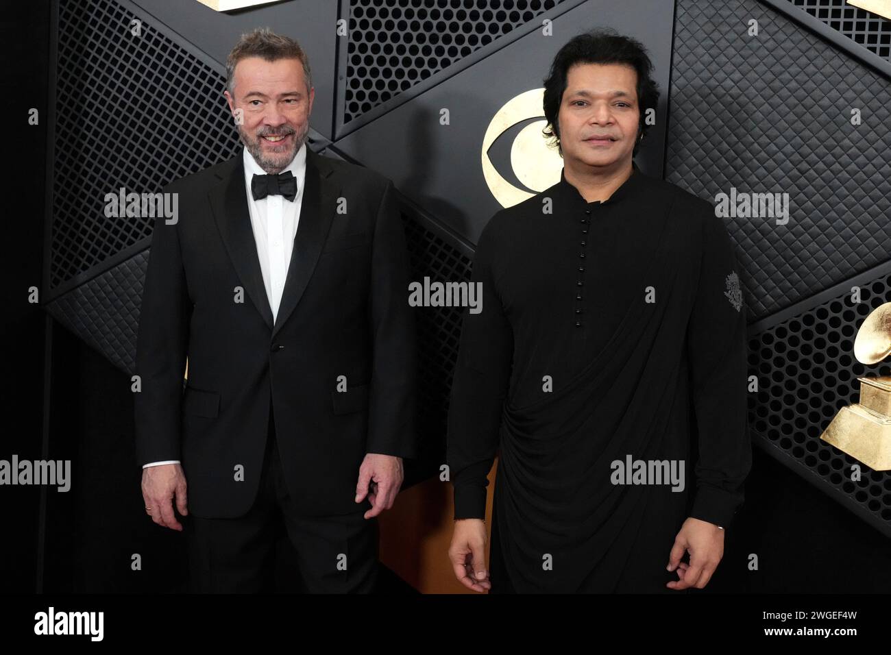 Jason Kyle Howard, left, and Silas House arrive at the 66th annual 