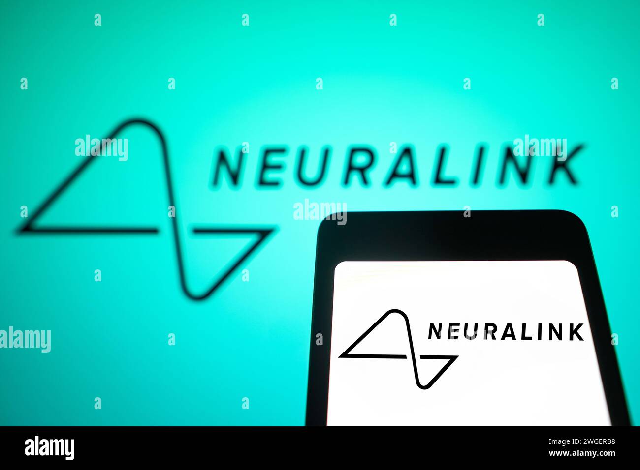 In this photo illustration, the Neuralink logo is displayed on a
