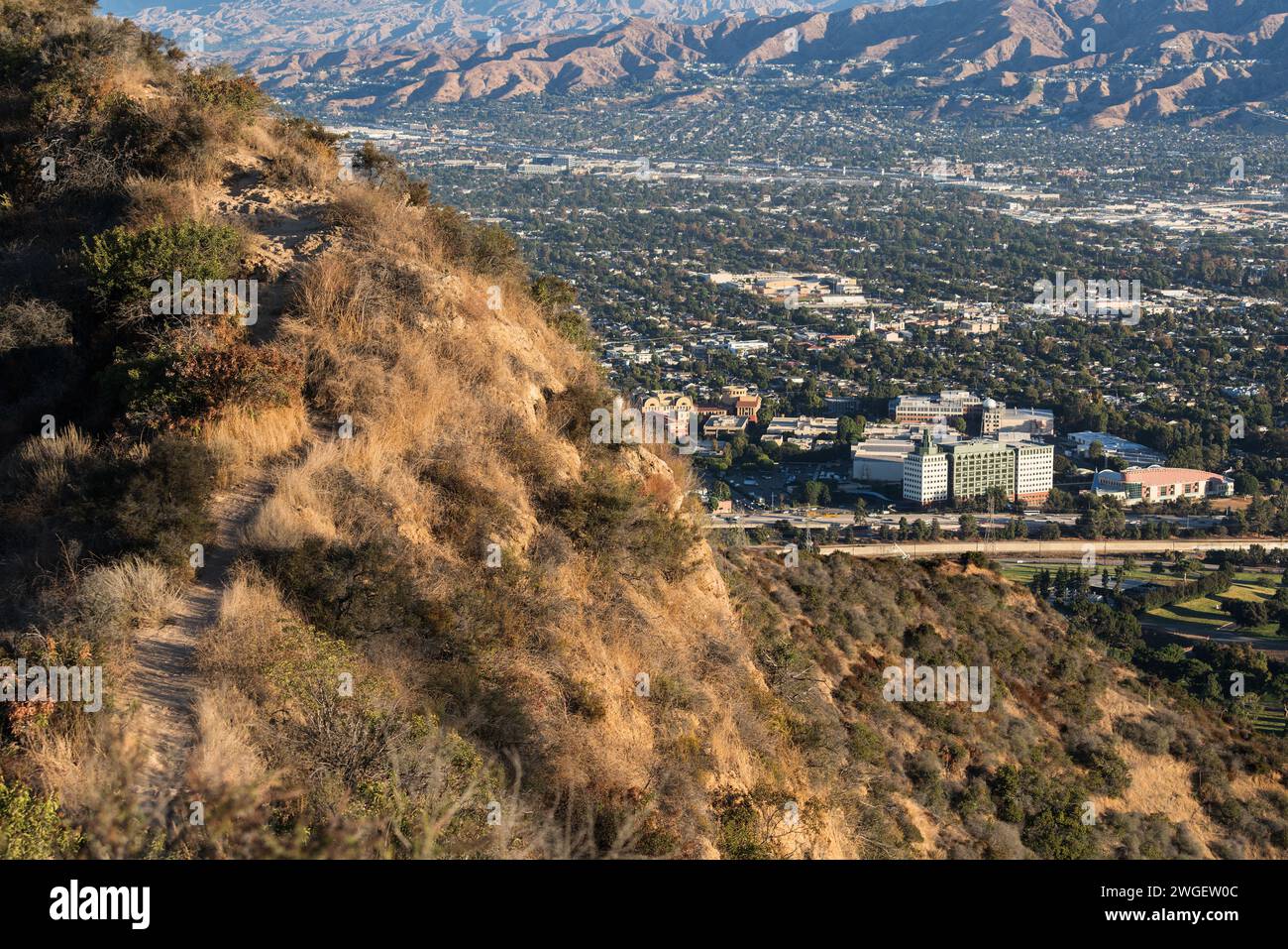 Steep Griffith Park hiking trail above Burbank and Los Angeles in Southern California. Stock Photo