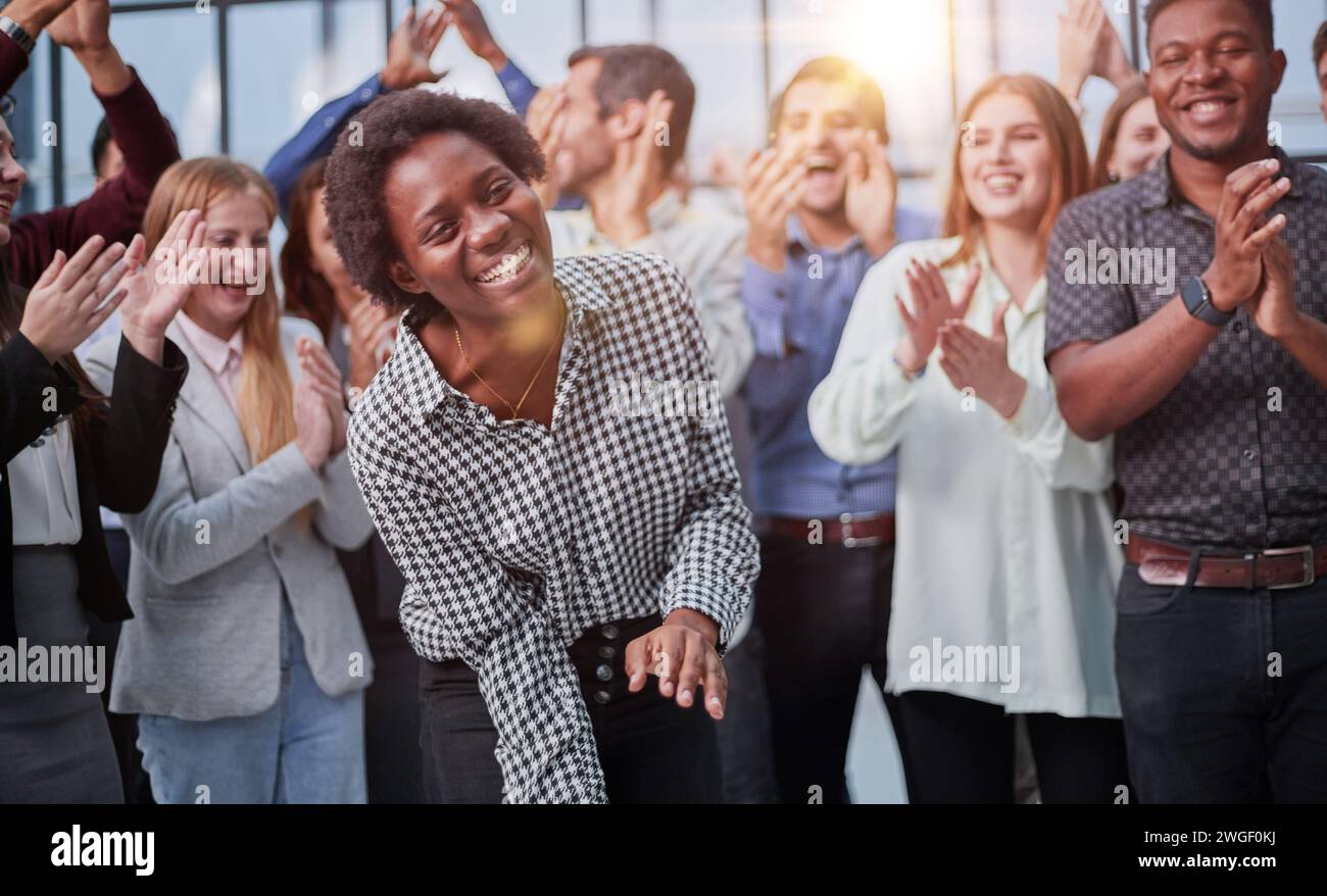 Business team celebrating a triumph with arms up Stock Photo - Alamy