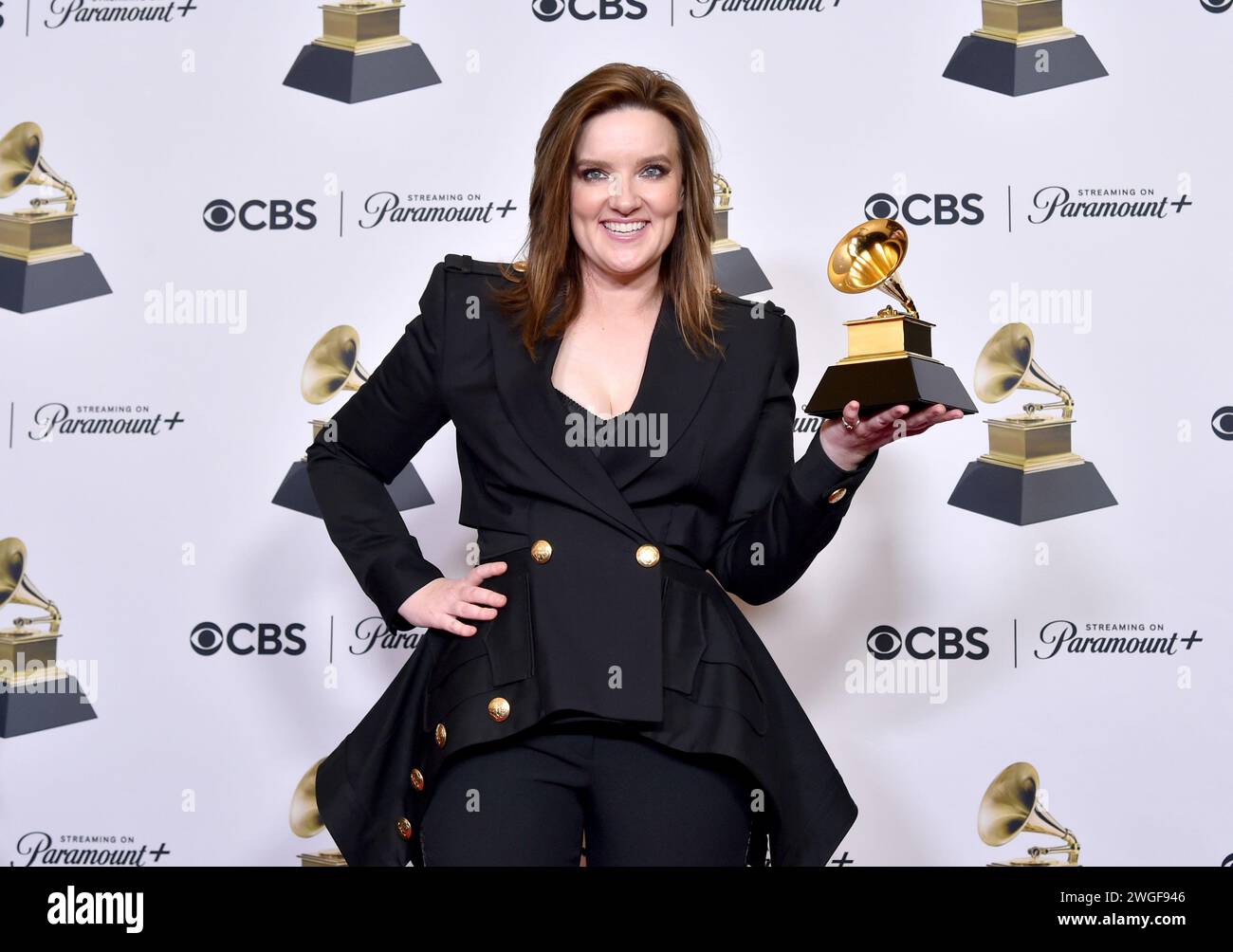Brandy Clark poses in the press room with the award for best americana