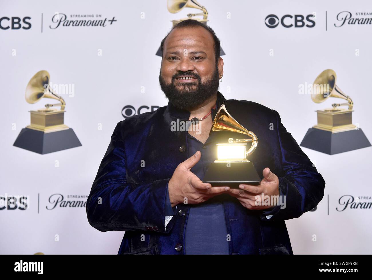 V Selvaganesh of Shakti poses in the press room with the award for best