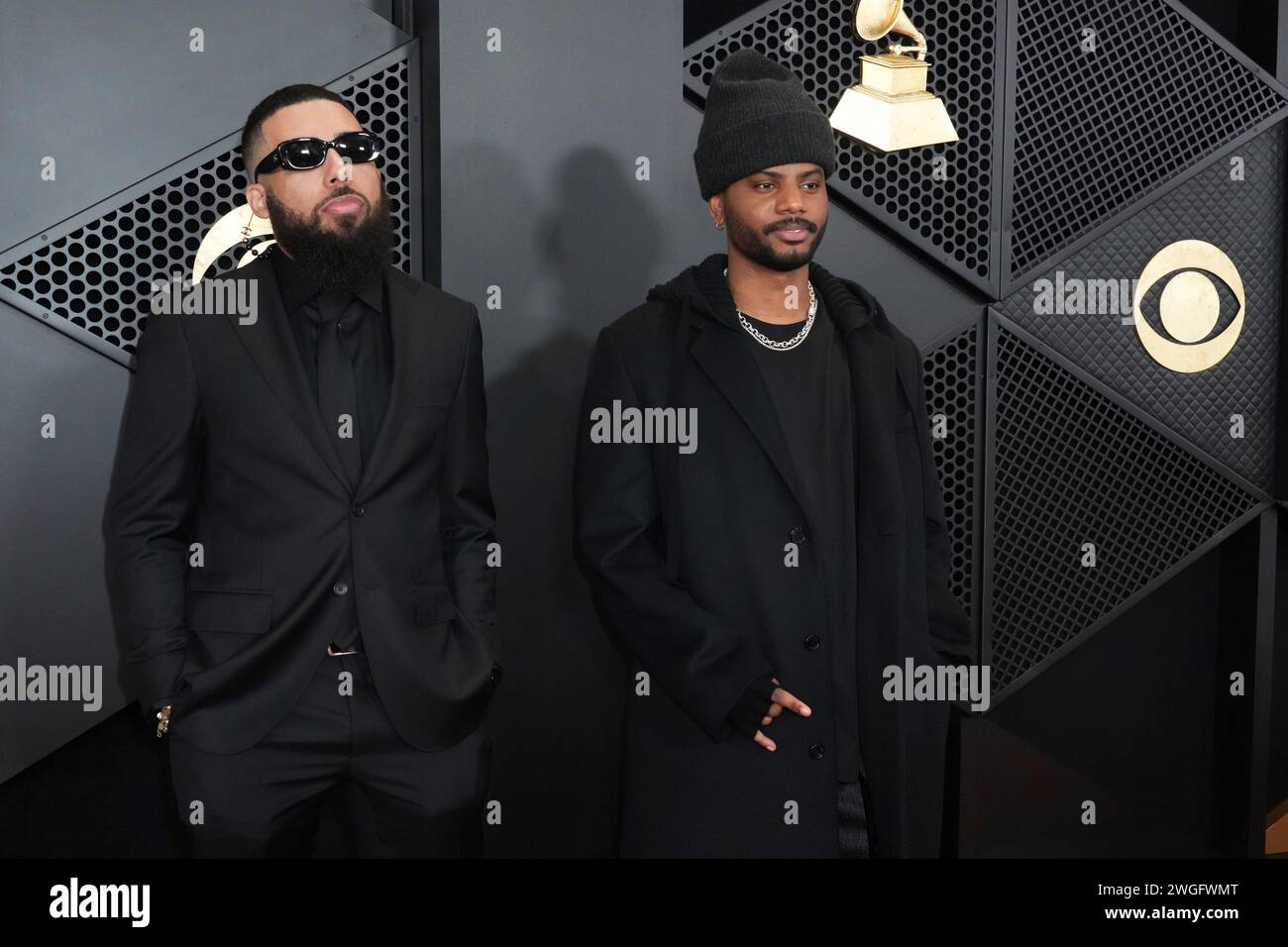Charlie Heat, left, and Bryson Tiller arrive at the 66th annual Grammy
