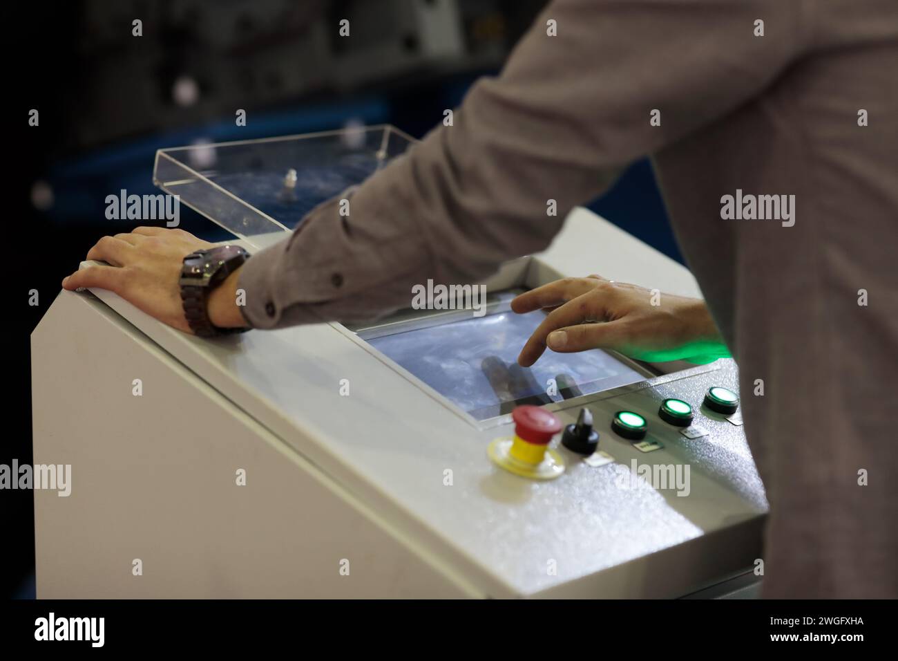 Working with industrial touchscreen control panel. Selective focus. Stock Photo