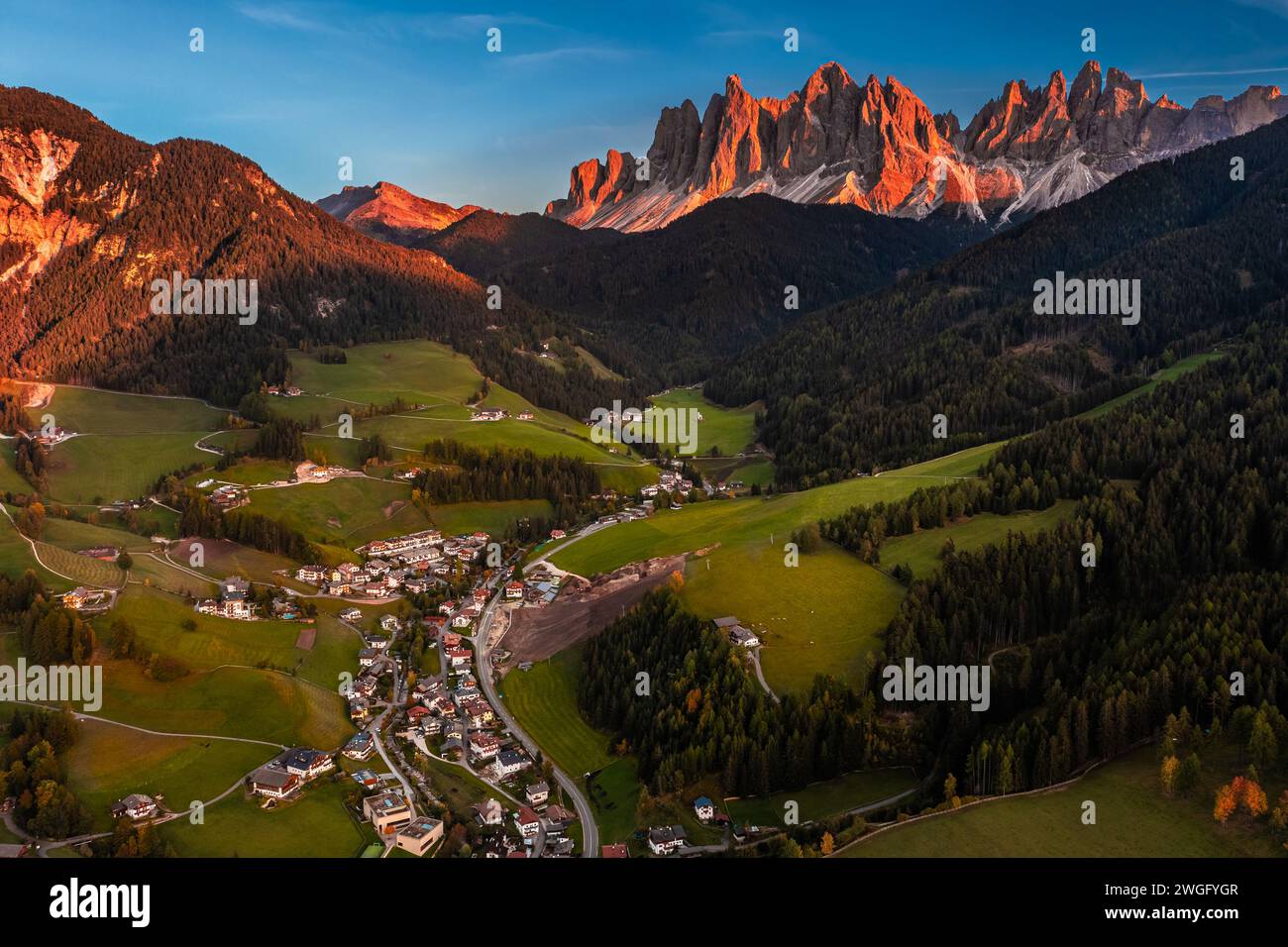 Val Di Funes, Dolomites, Italy - Aerial view of the Val di Funes province at South Tyrol with St. Johann church in San Valentino, the Italian Dolomite Stock Photo