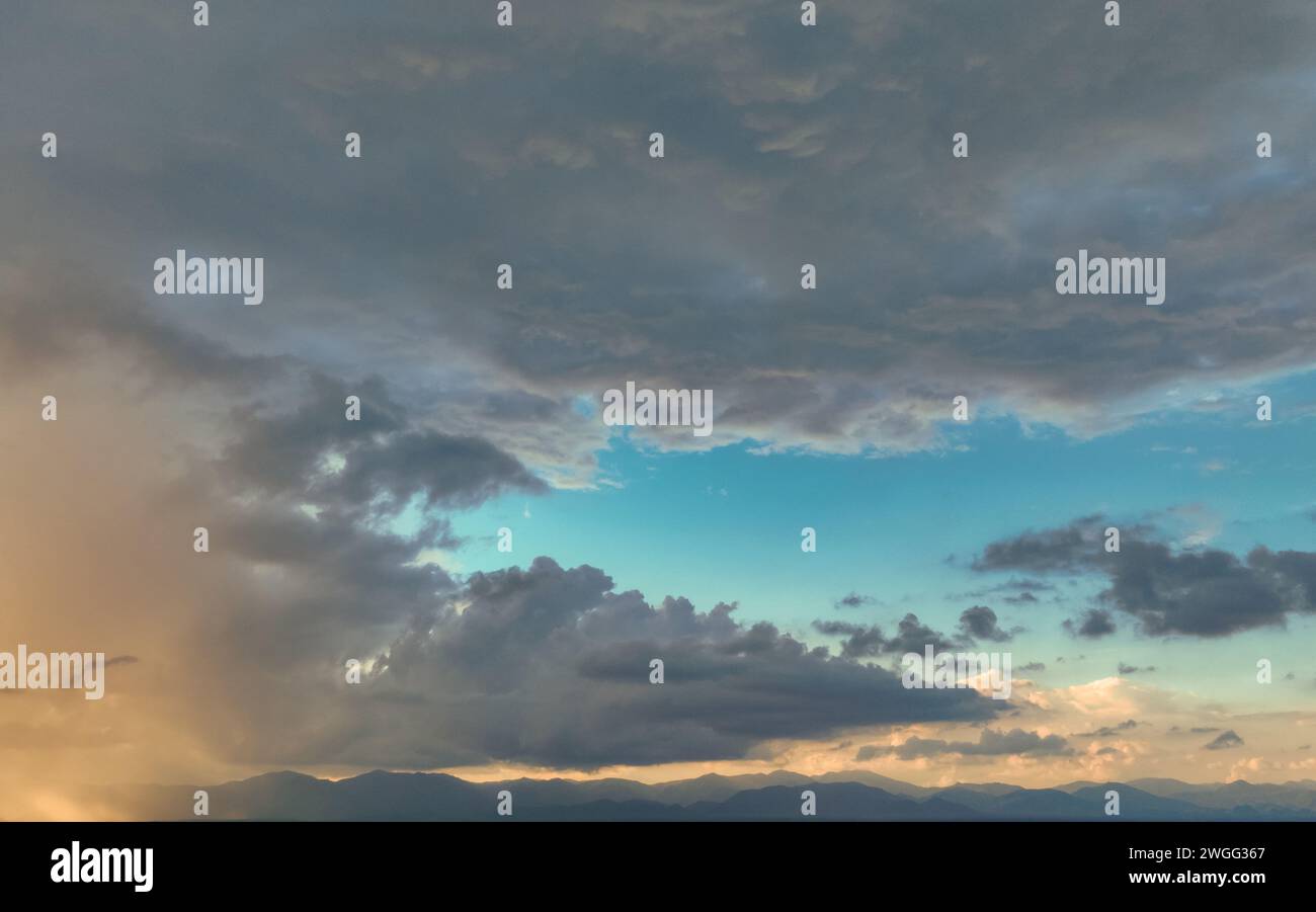 Beautiful blue sky and cumulus clouds abstract background. Cloudscape background. Blue sky and fluffy clouds. World Ozone Day. Ozone layer. Overcast Stock Photo