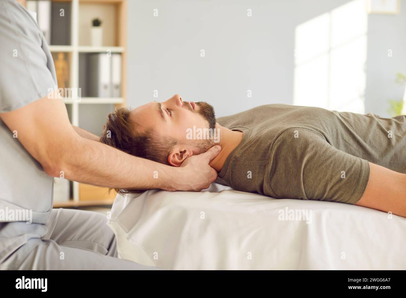 Head and neck massage, manual therapy rehabilitation, physical therapist doing manipulative