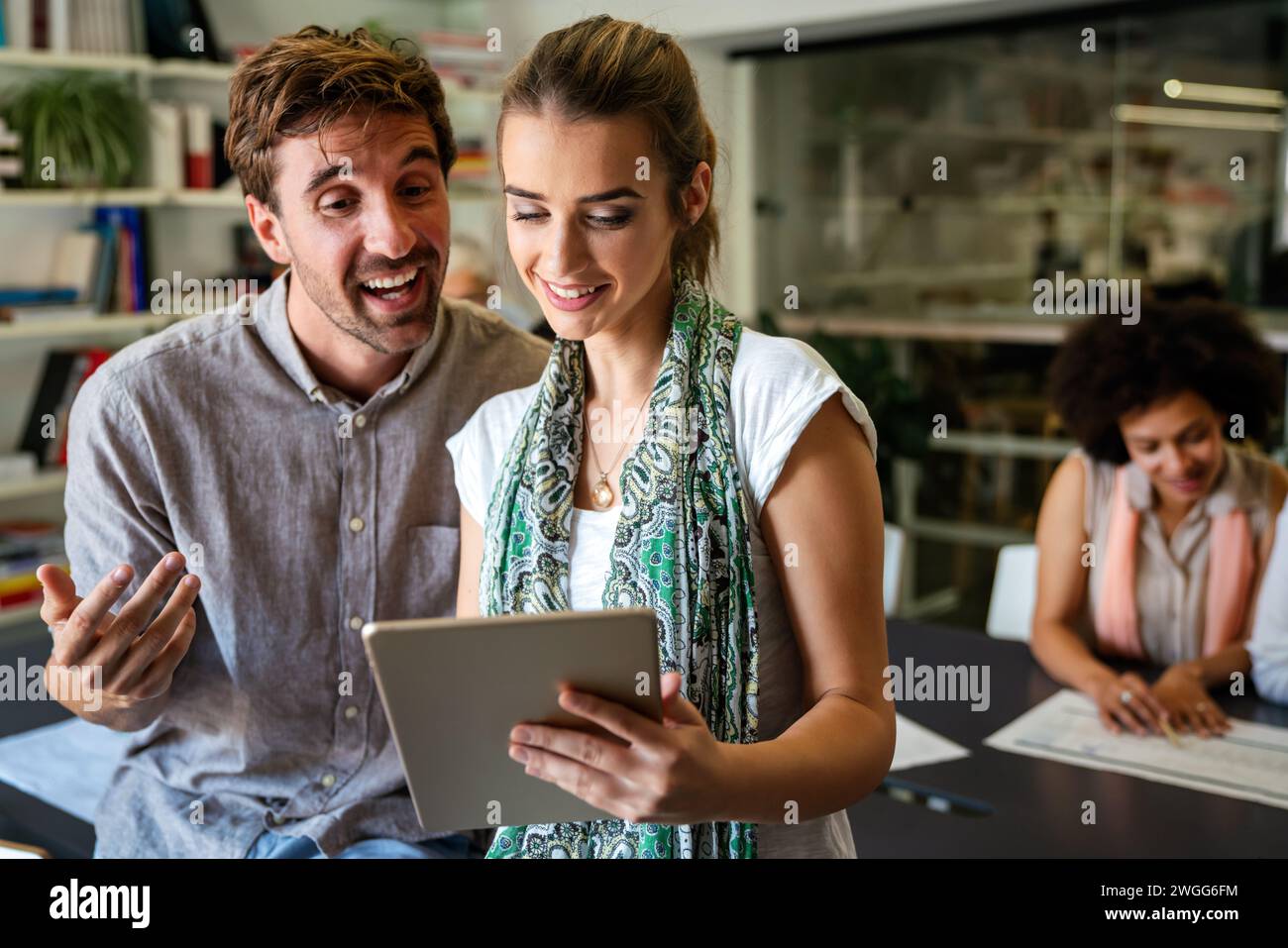 Programmers cooperating at IT company developing apps. People business work office concept Stock Photo