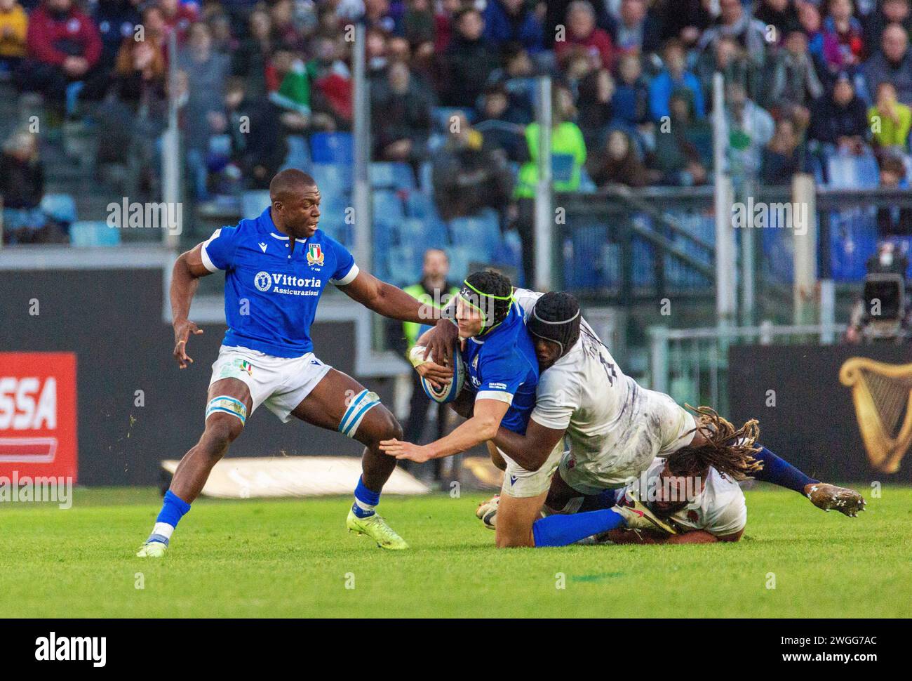 Rugby Six Nations. Italy vs England. Stadio Olimpico. Rome. 03/02/2024. Maro Itoje tackles Italy's Jaun Ignazio Brex with Alessandro Izekor Stock Photo