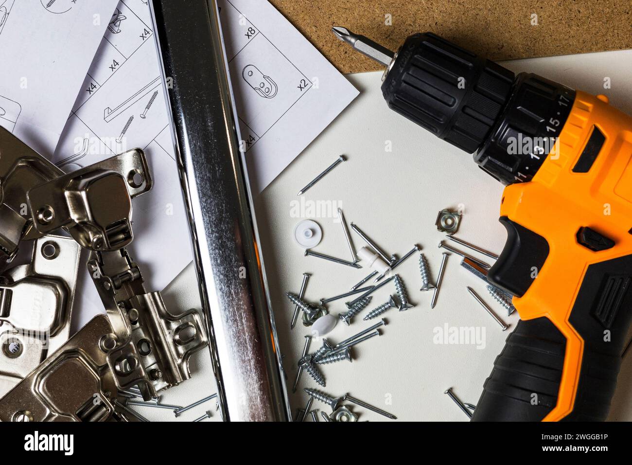 Furniture fittings. Furniture assembly hardware options and tools on a