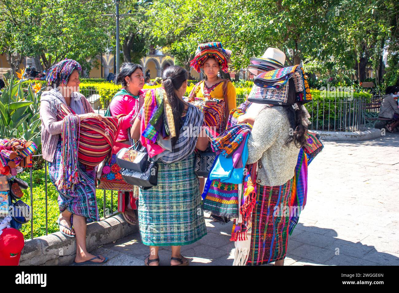 Female handicraft sellers in Central Park, Antigua, Sacatepéquez Department, Republic of Guatemala Stock Photo