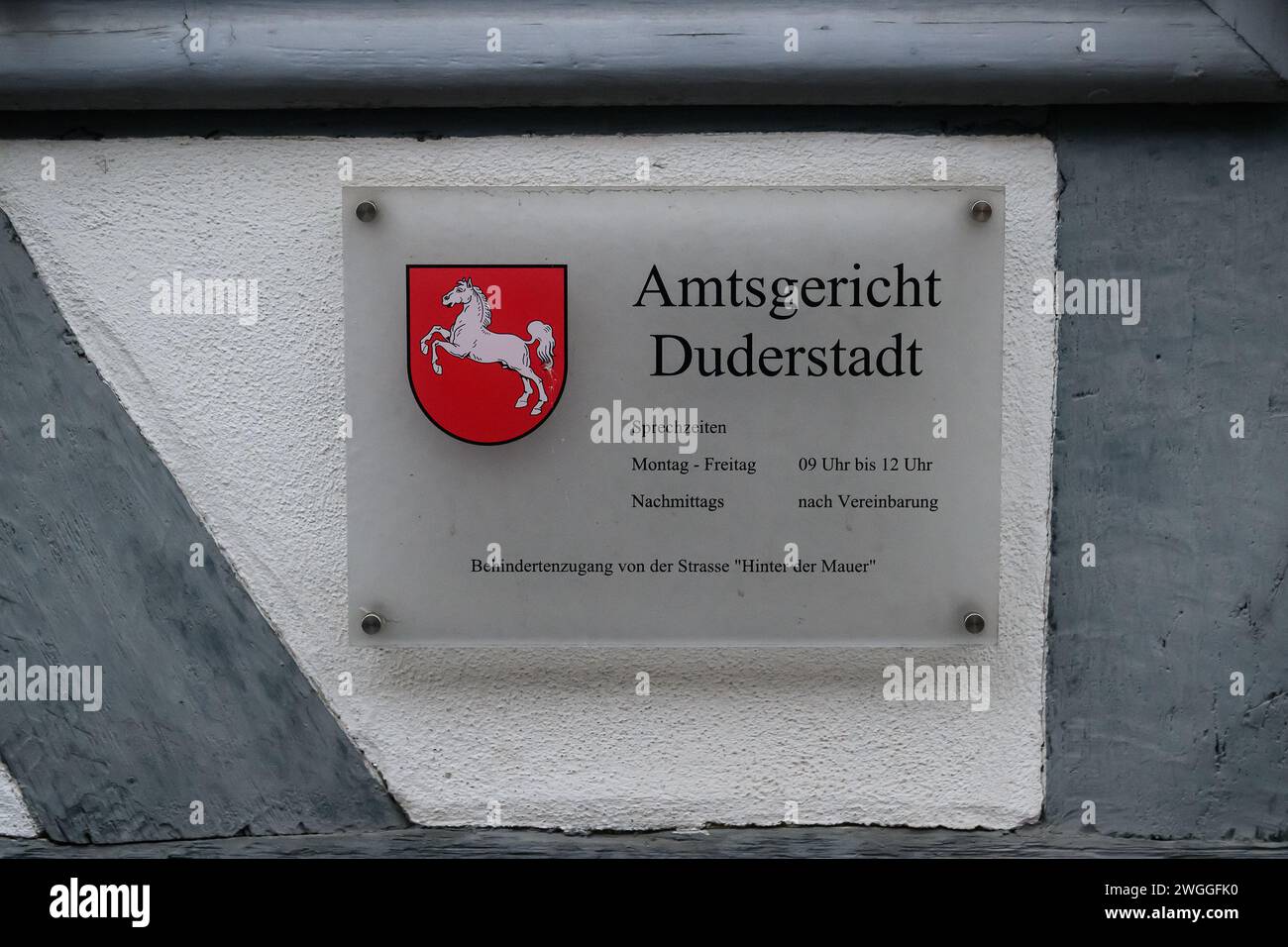 Duderstadt, Germany. 05th Feb, 2024. View of the 'Duderstadt District Court' sign on the building façade. A doctor from Lower Saxony is on trial from Monday (9.00 a.m.) for, among other things, false medical certificates during the Corona period. The doctor from Duderstadt is said to have certified without medical grounds that children should be permanently exempted from all vaccinations recommended and required by the Standing Vaccination Commission. Credit: Swen Pförtner/dpa/Alamy Live News Stock Photo