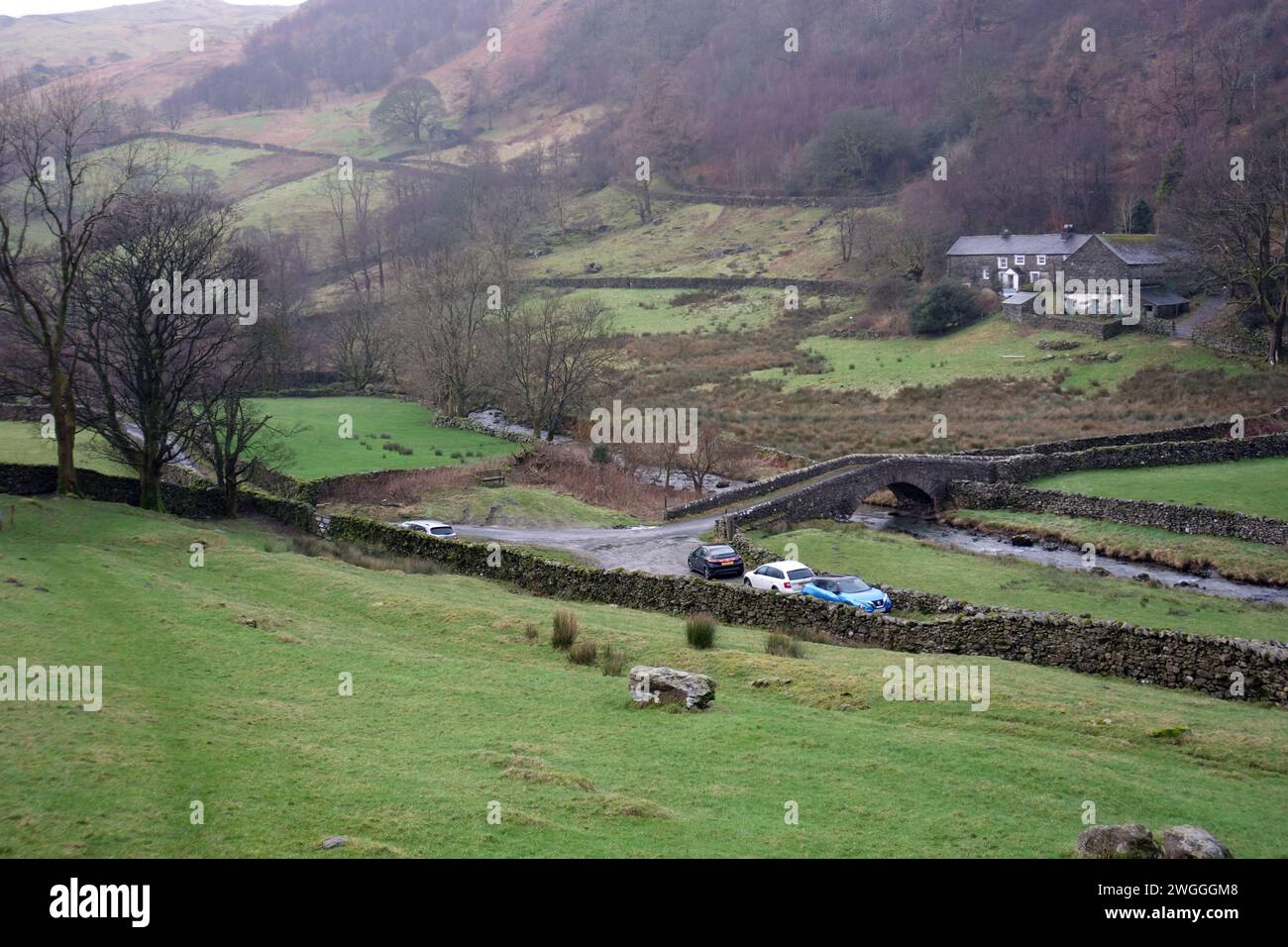 Old Stone Arch Bridge over the River Sprint by the Farming Hamlet of Sadgill in Longsleddale, Lake District National Park, Cumbria, England, UK. Stock Photo
