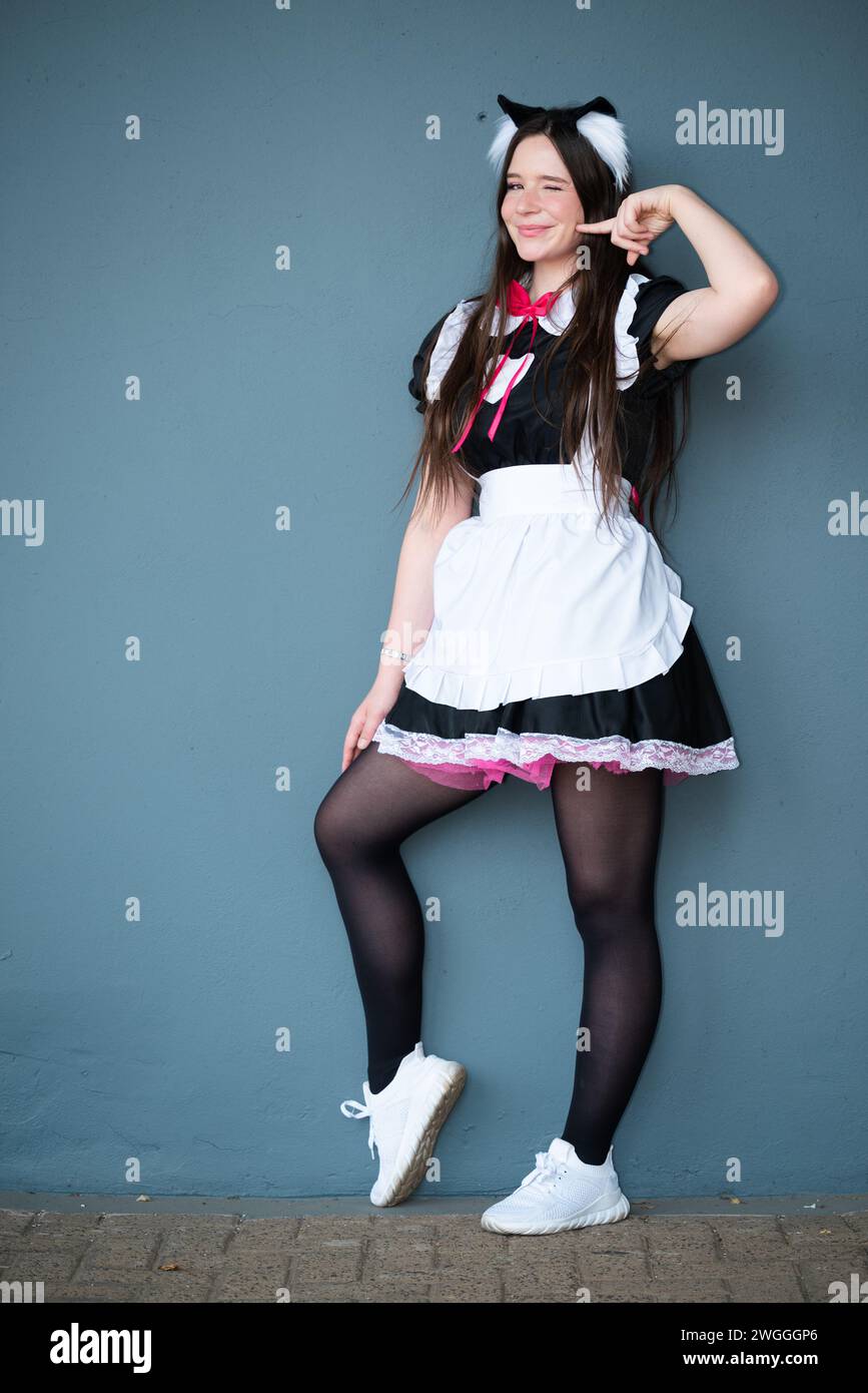 A cosplayer dressed as a Japanese Maid Stock Photo