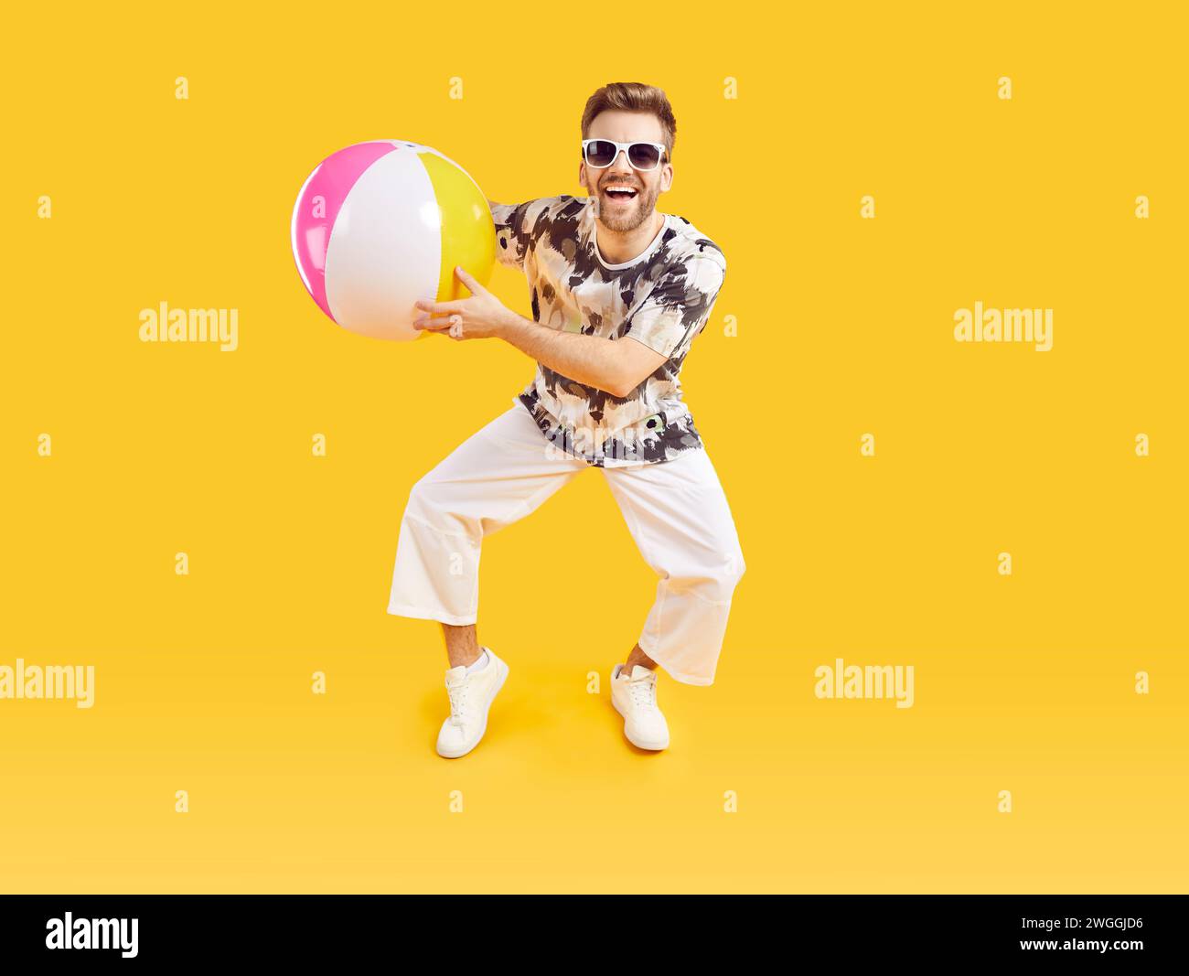 Excited happy man holding hi-res stock photography and images - Alamy